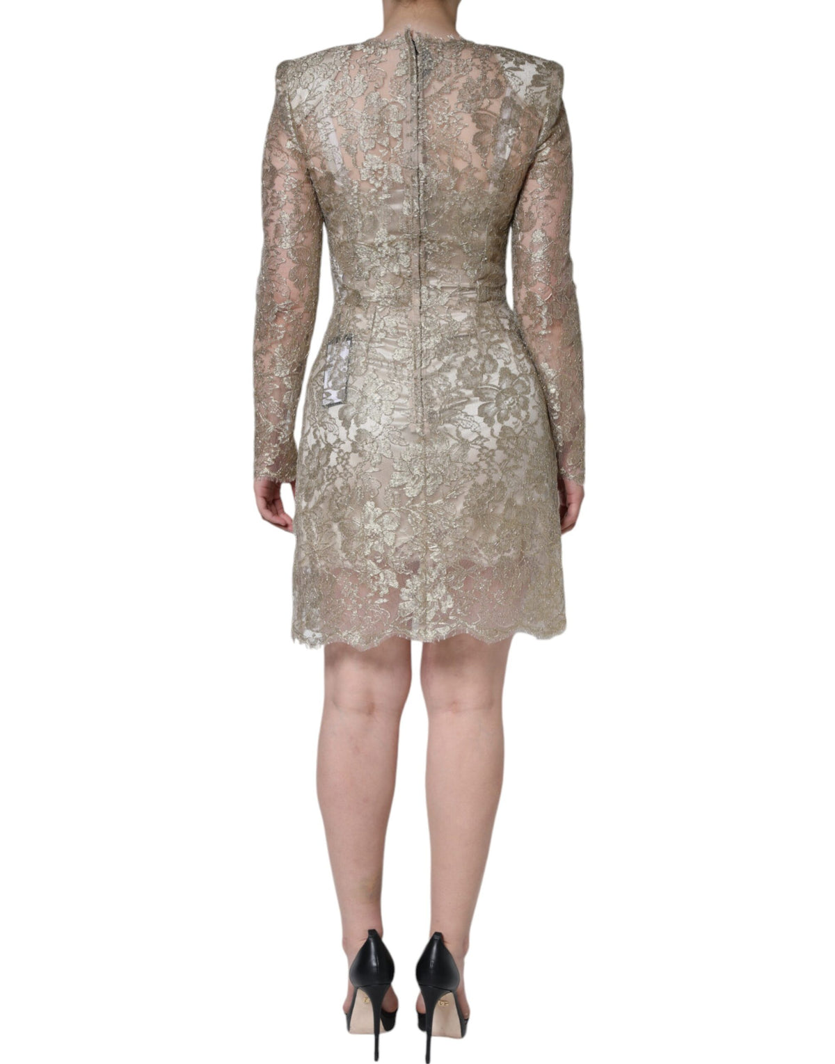 Indulge in the exquisite allure of the Dolce & Gabbana Gold Floral Lace A-line Sheath Mini Dress, a limited edition masterpiece crafted with luxurious materials, embodying timeless elegance and sophisticated charm.