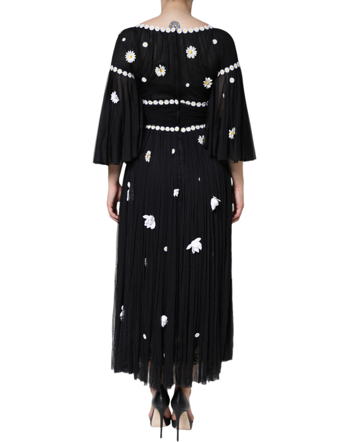 Experience the allure of the Dolce & Gabbana Black Silk Daisy A-line Long Maxi Dress, a masterpiece of Italian craftsmanship that embodies timeless luxury and elegance.