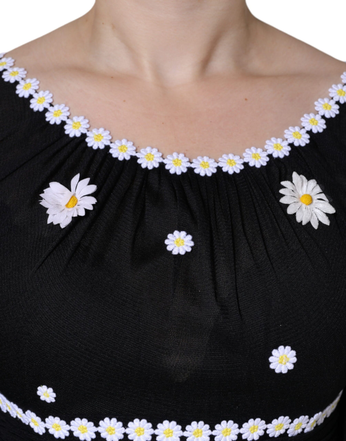 Experience the allure of the Dolce & Gabbana Black Silk Daisy A-line Long Maxi Dress, a testament to Italian craftsmanship that embodies luxury and timeless elegance.