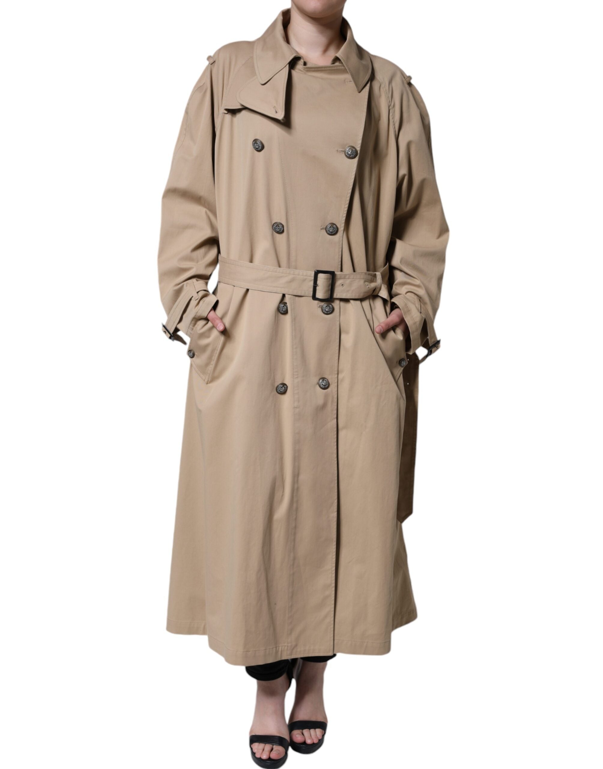 Elevate your style with the Dolce & Gabbana Khaki Double Breasted Trench Coat, a luxurious blend of cotton and elastane, embodying exquisite Italian craftsmanship and timeless elegance.