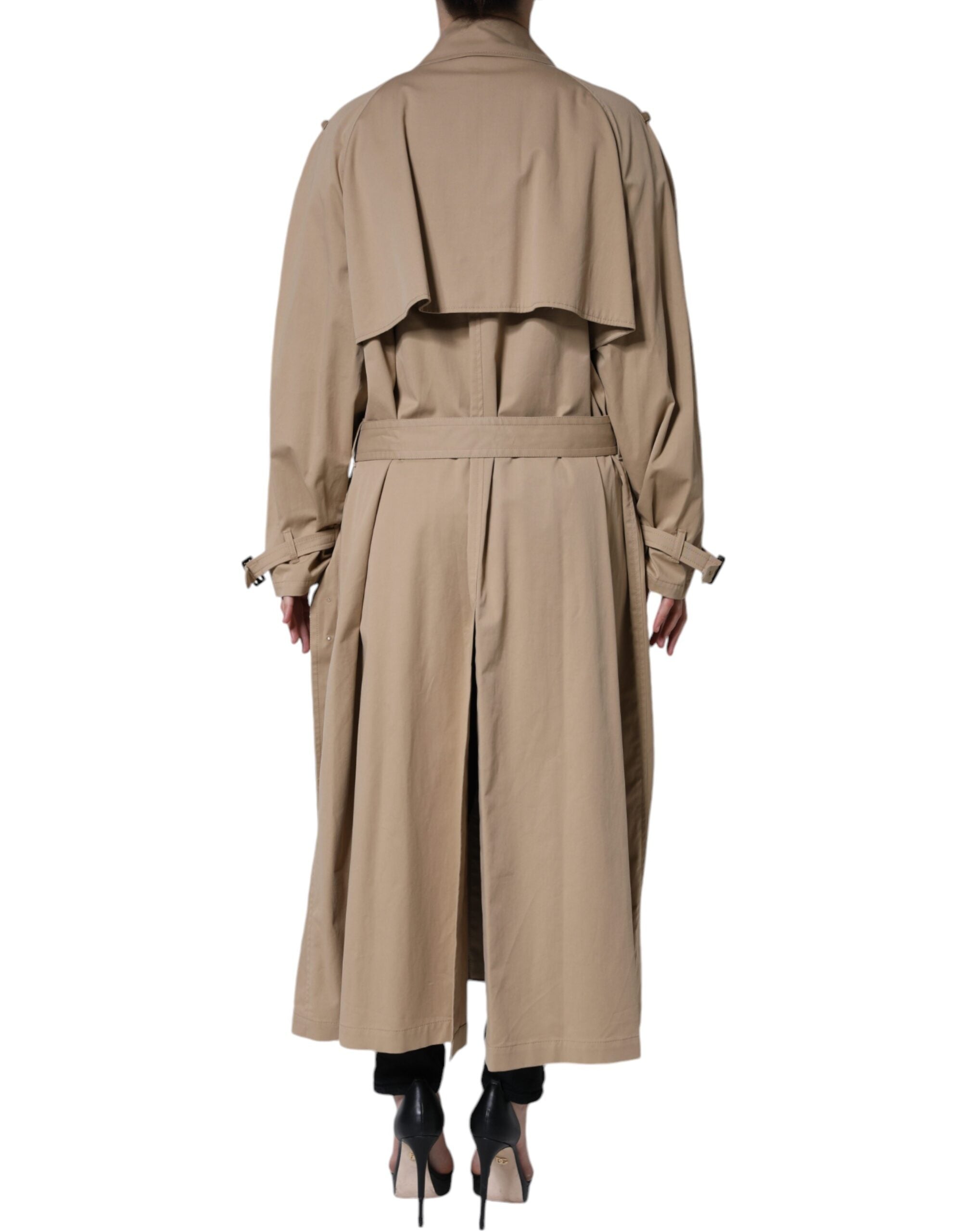 Elevate your style with the Dolce & Gabbana Khaki Double Breasted Trench Coat, a luxurious blend of cotton and elastane, embodying Italian craftsmanship and timeless elegance.