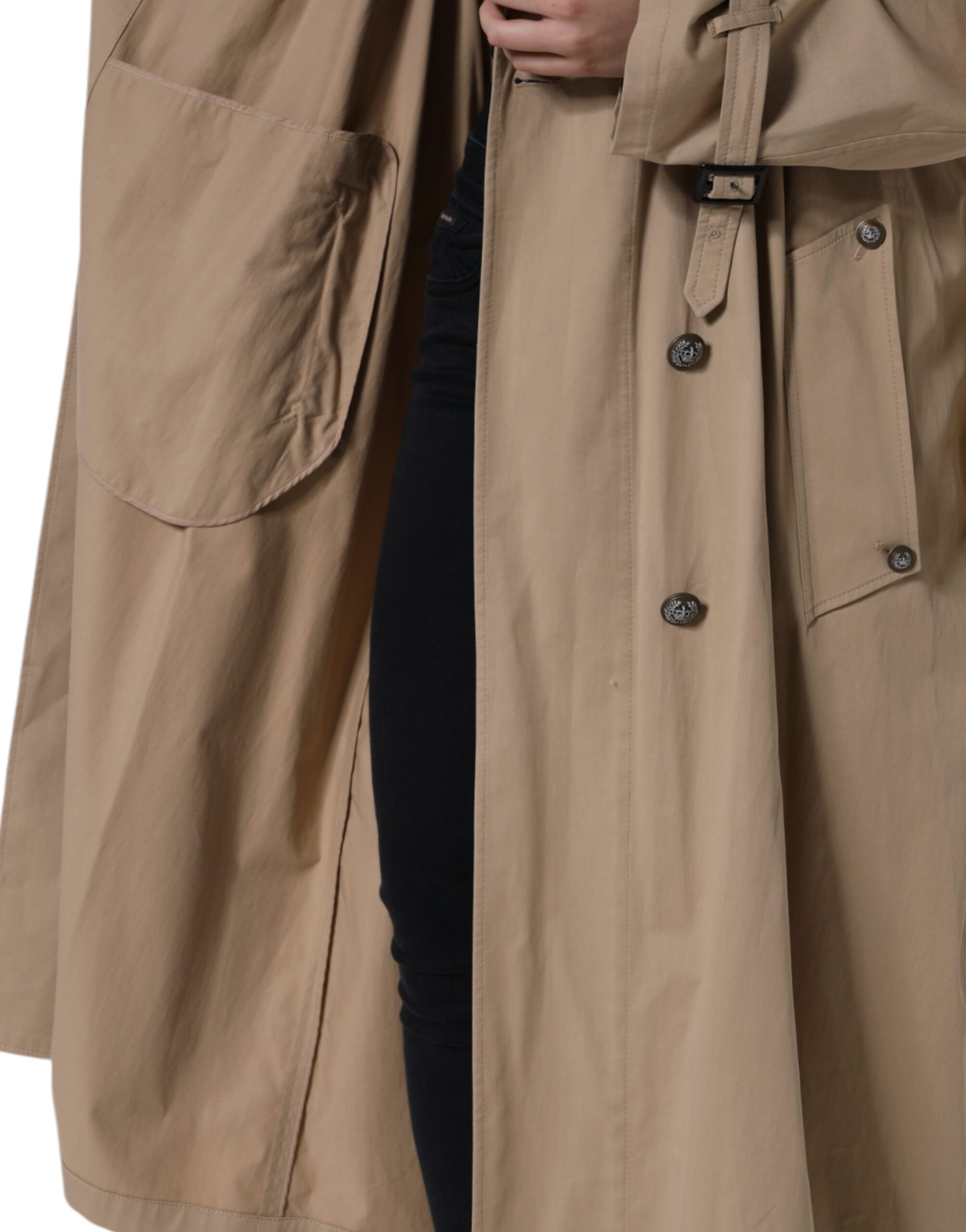 Elevate your style with the Dolce & Gabbana Khaki Double Breasted Trench Coat, a luxurious blend of cotton and elastane, embodying Italian craftsmanship and timeless elegance.
