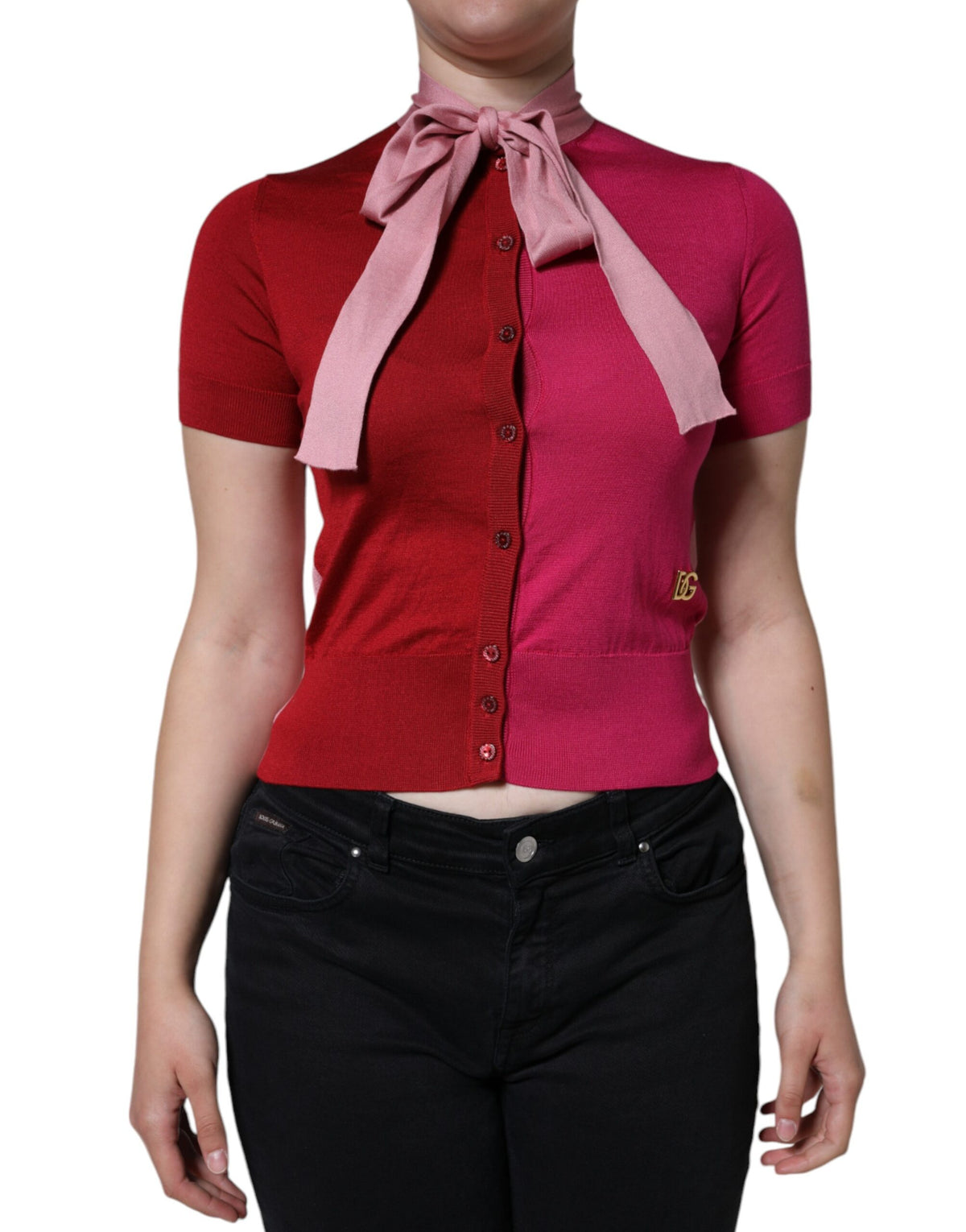 Experience the allure of Dolce & Gabbana's Pink Silk Ascot Collar Top, a timeless masterpiece that embodies luxury and elegance for the discerning individual.