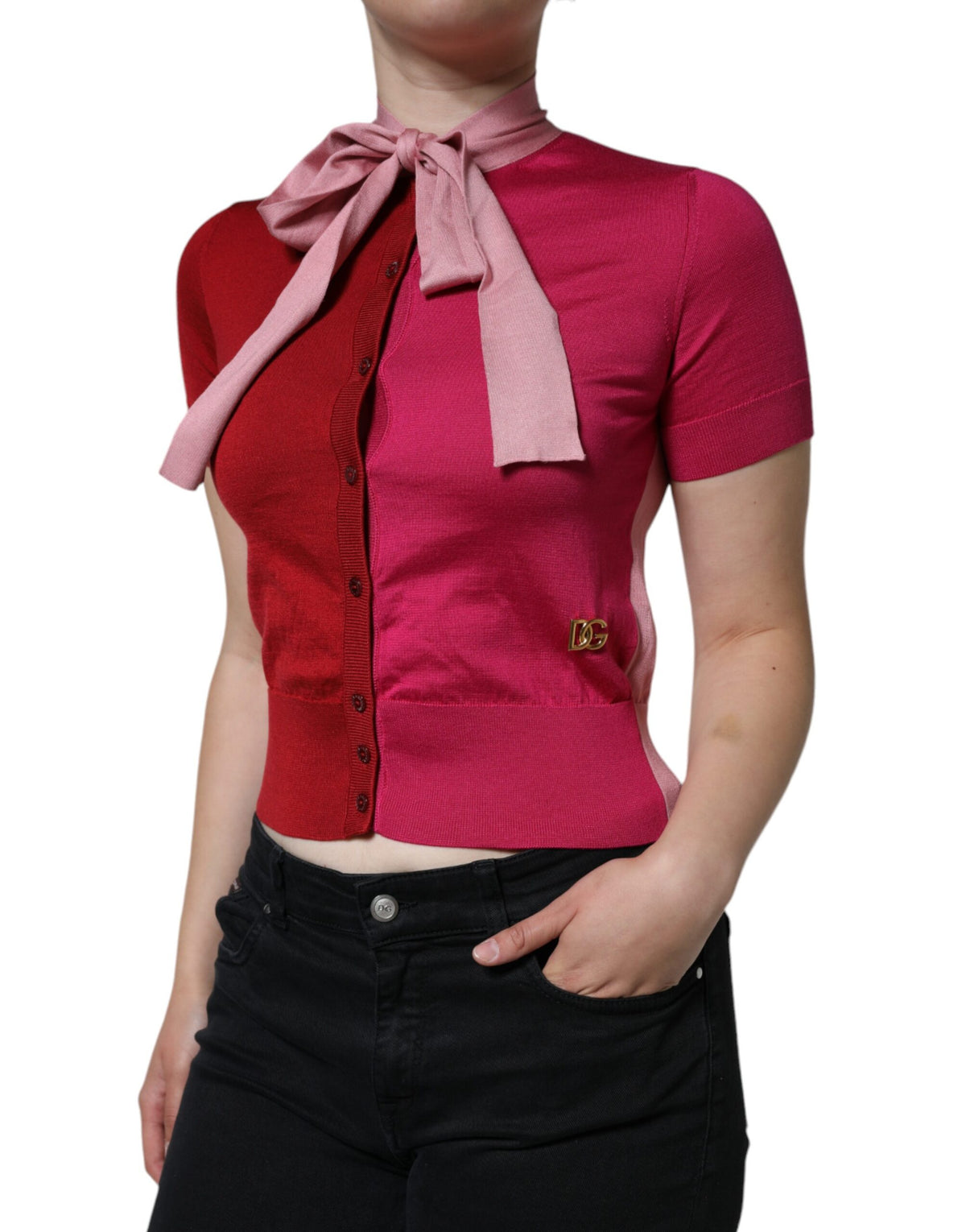Indulge in the exquisite Dolce & Gabbana Pink Short Sleeves Pullover, a silk masterpiece that embodies timeless elegance and sophisticated allure for every occasion.