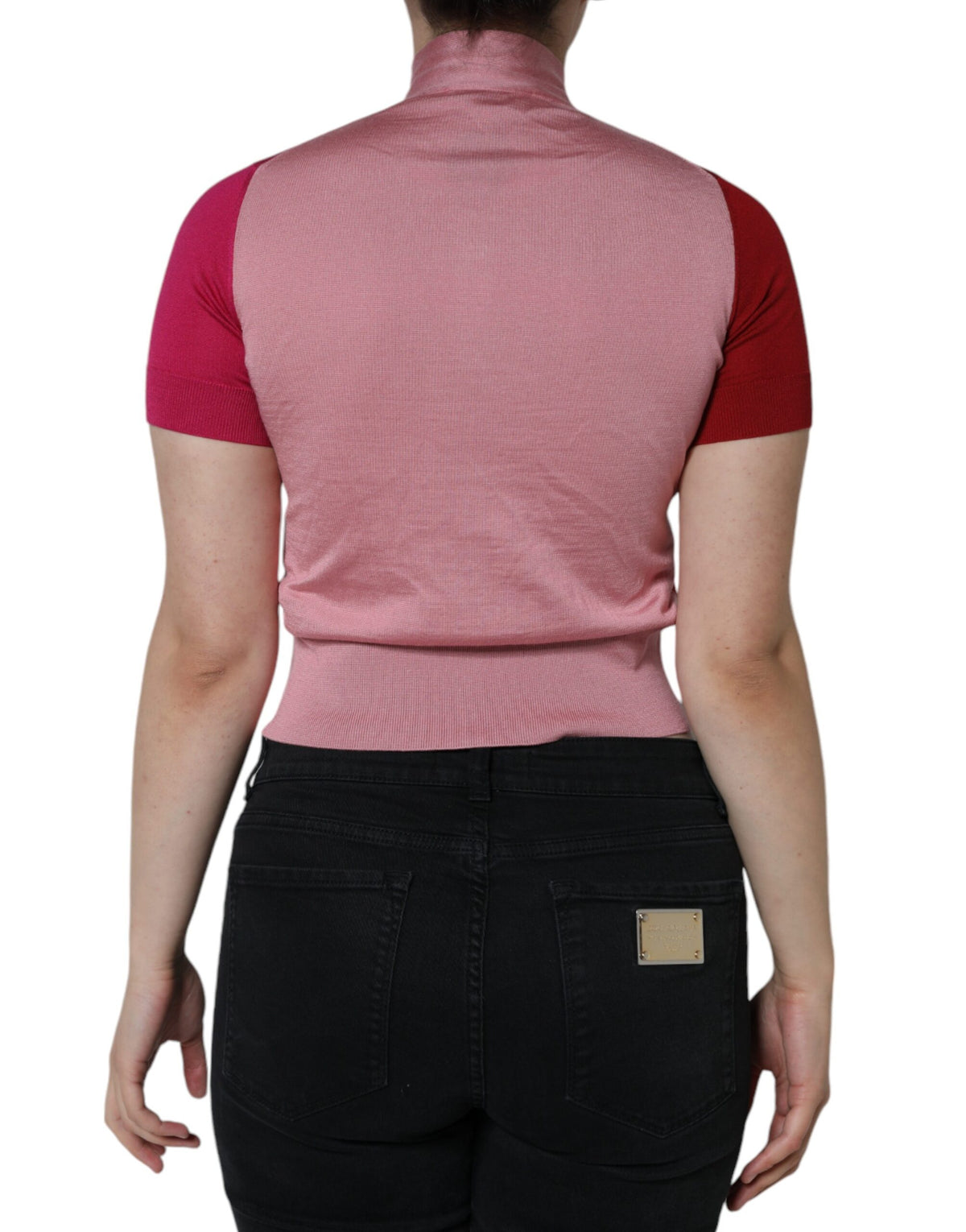 Indulge in the exquisite Dolce & Gabbana Pink Silk Ascot Collar Top, a timeless blend of luxury and elegance, perfect for the discerning individual who appreciates haute couture.