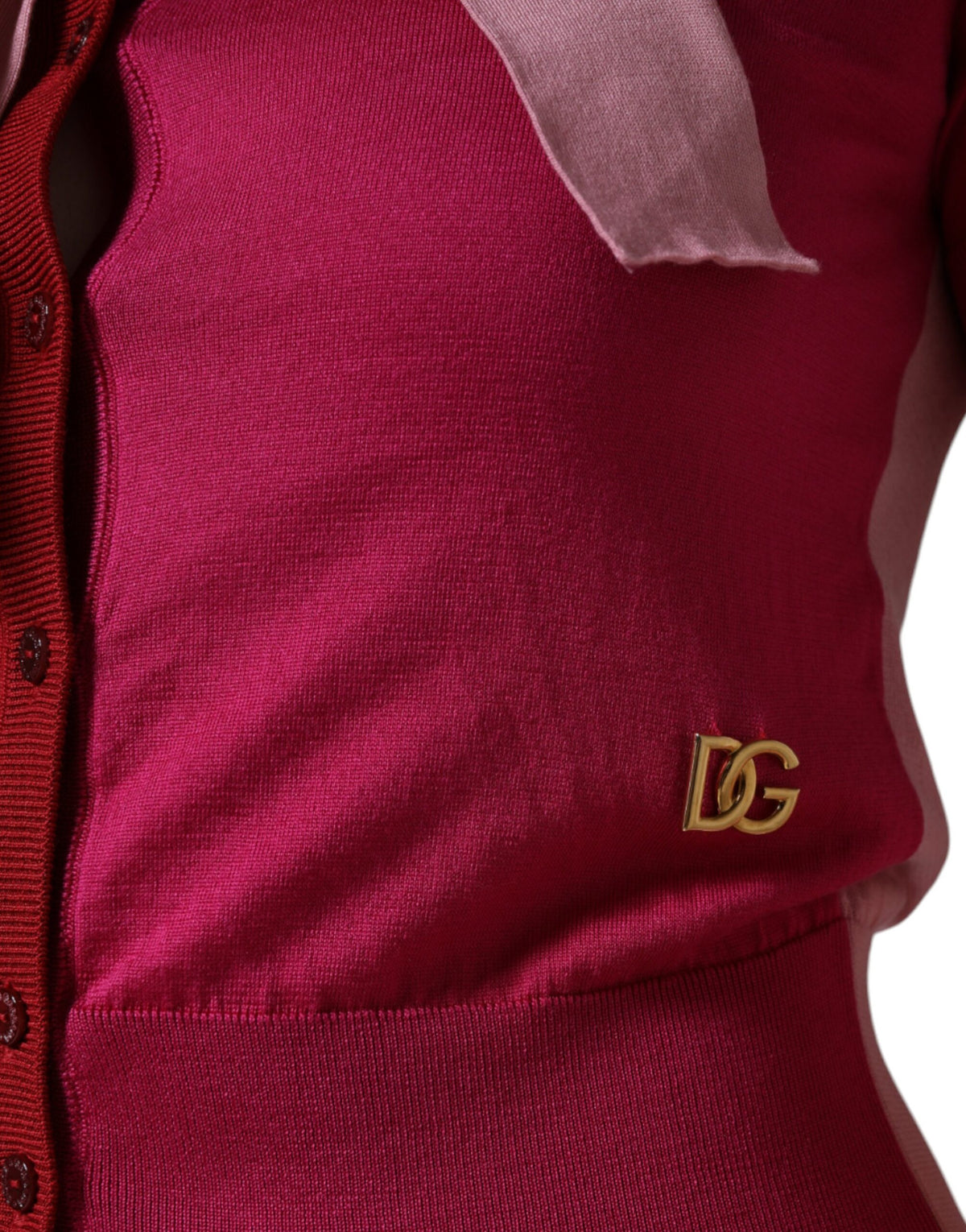 Elevate your wardrobe with the Dolce & Gabbana Pink Short Sleeves Pullover Ascot Collar Top, a silk masterpiece that embodies timeless elegance and sophisticated allure.
