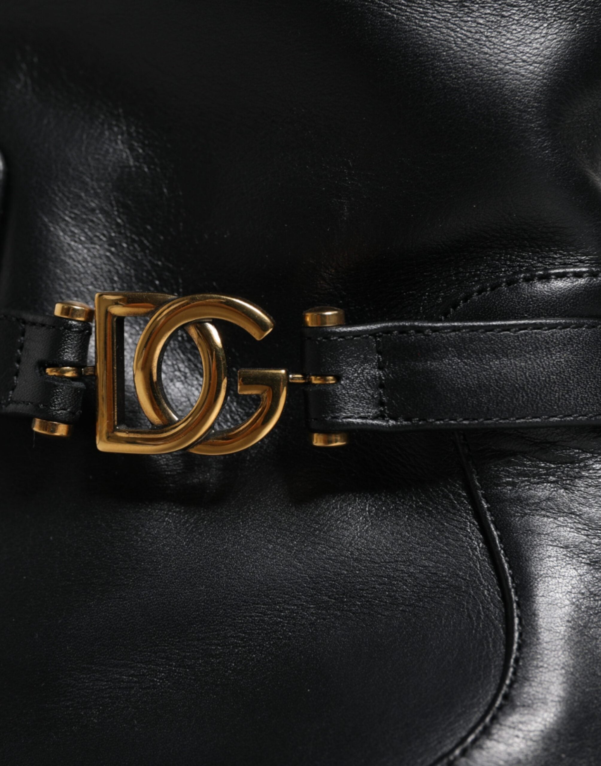Elevate your style with Dolce & Gabbana Black Leather Logo Mid Calf Boots, crafted from exquisite calf leather, embodying timeless elegance and sophisticated allure.