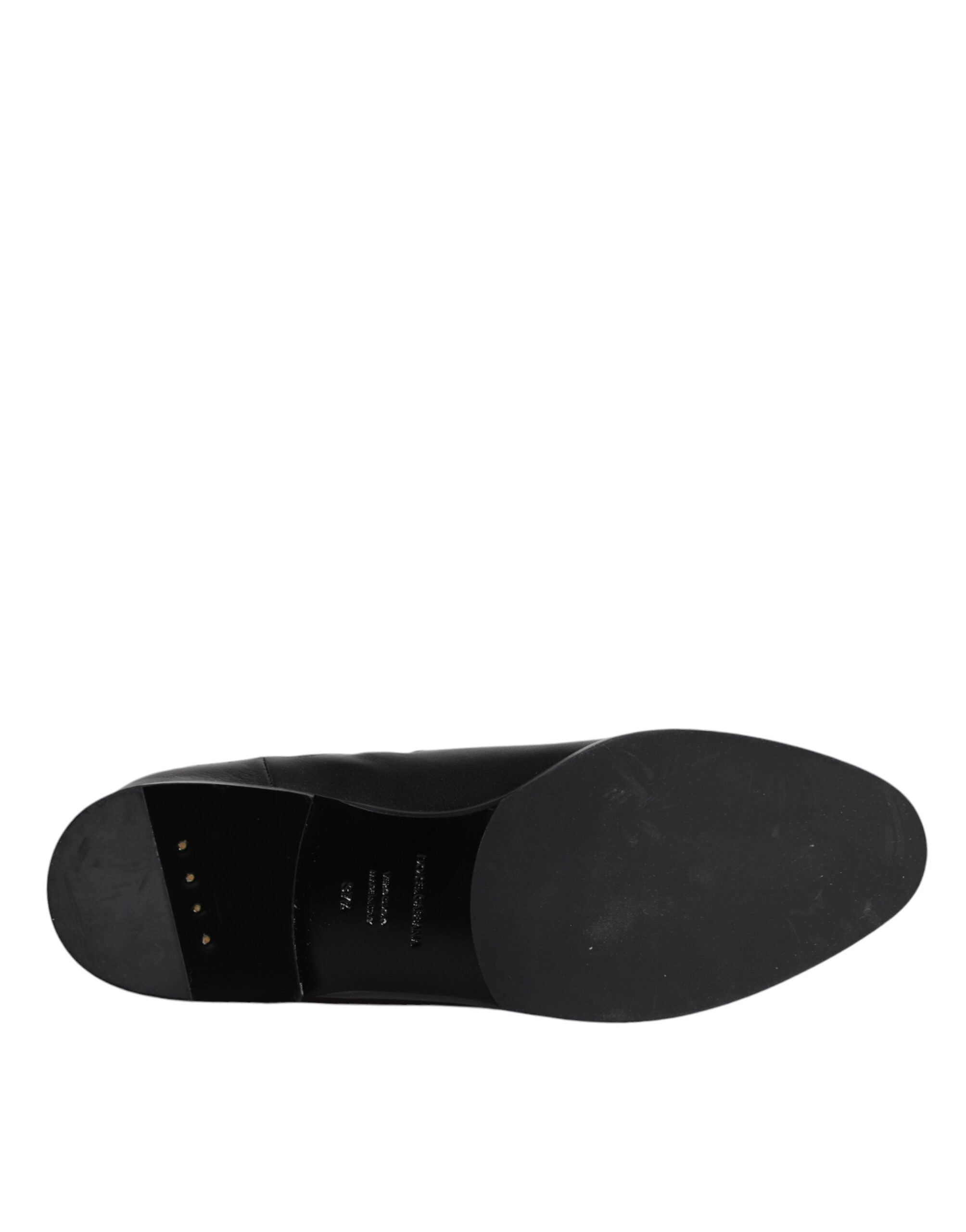 Indulge in the exquisite Dolce & Gabbana Black Leather Logo Mid Calf Boots, crafted from luxurious calf leather, embodying timeless elegance and sophisticated allure.