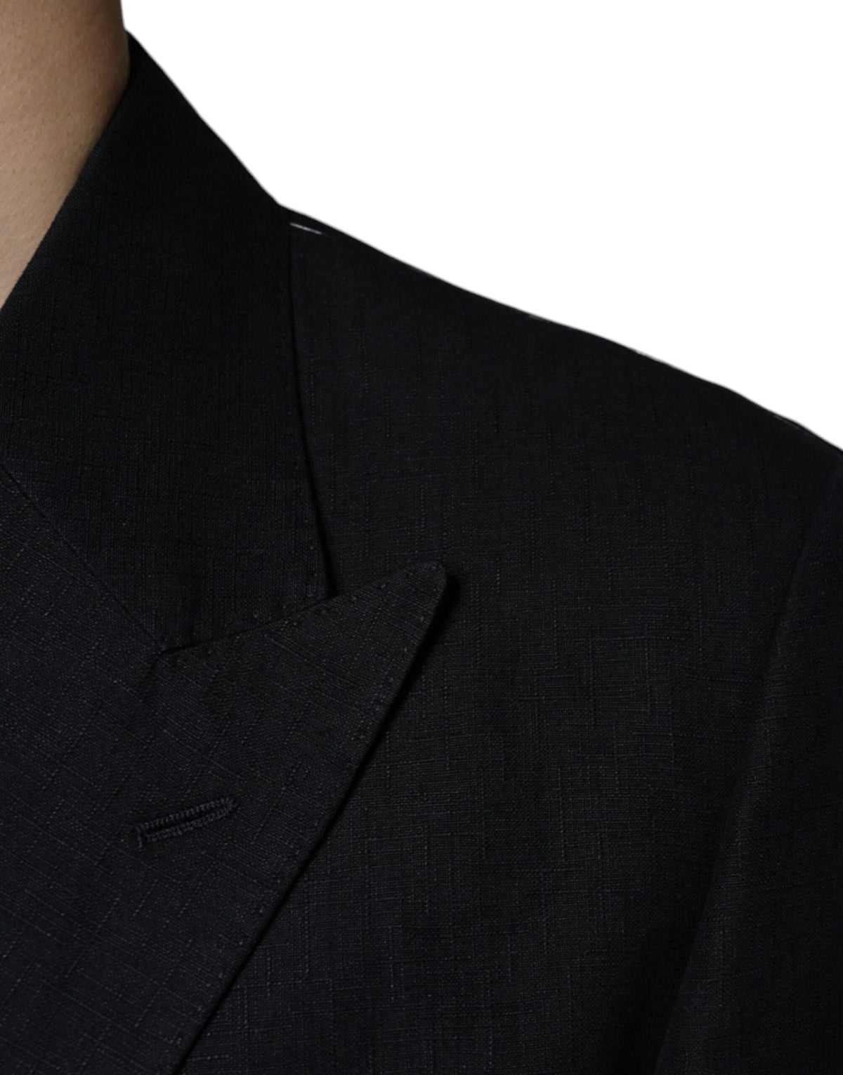 Elevate your style with the Dolce & Gabbana Black Linen Double Breasted Dress Blazer, a masterpiece of Italian craftsmanship that embodies timeless elegance and sophistication.