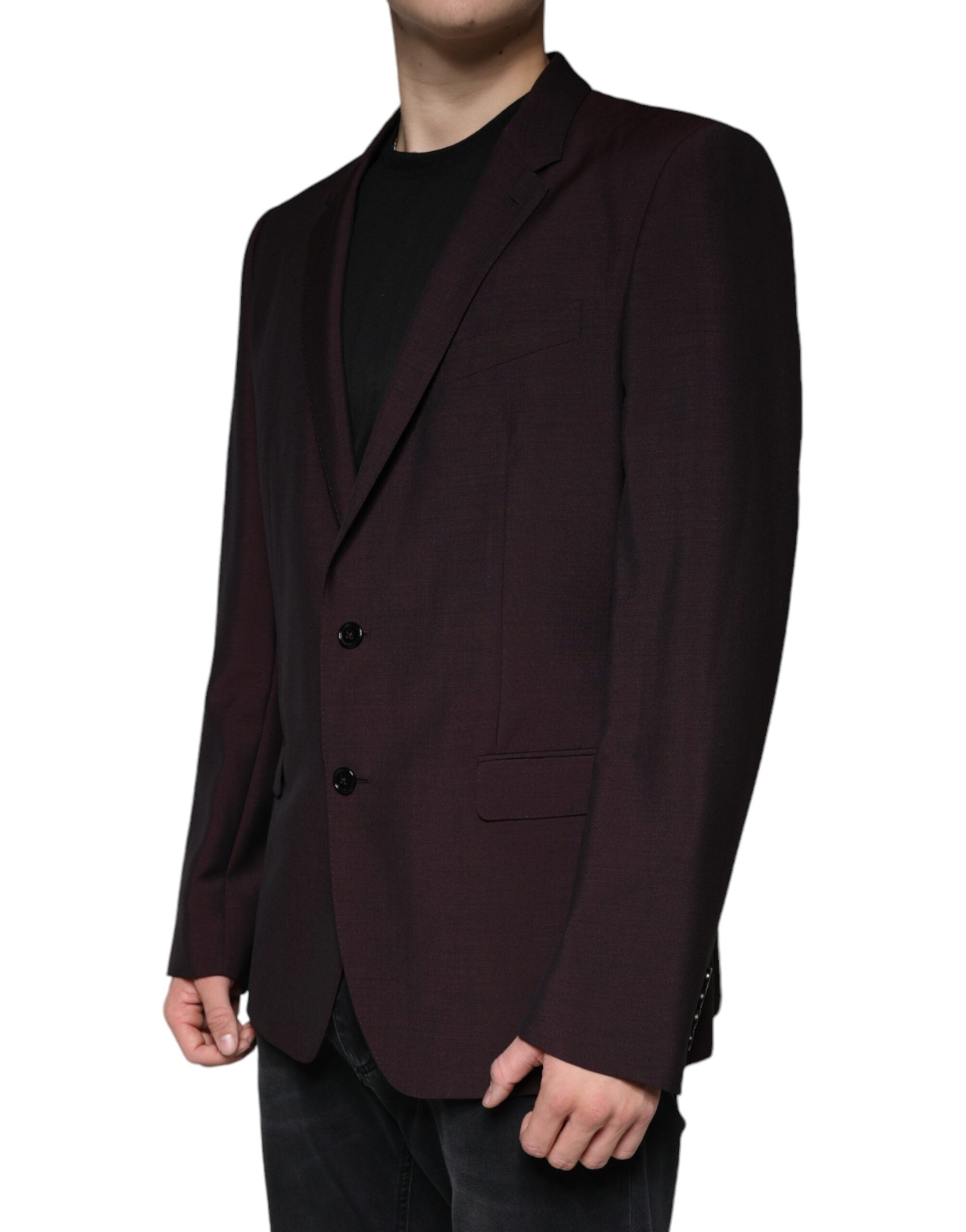 Discover the Dolce & Gabbana Bordeaux Wool Single Breasted Dress Blazer, a masterpiece of Italian craftsmanship that elevates your style with timeless elegance and luxurious allure.