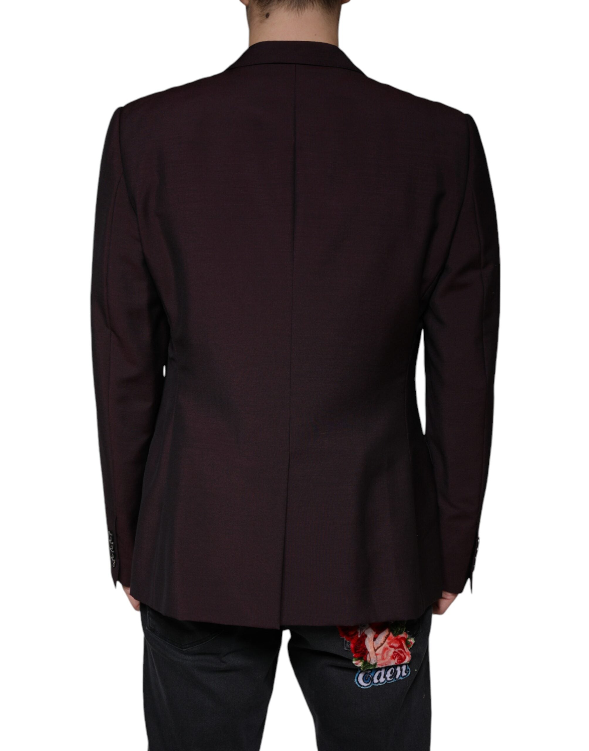 Elevate your wardrobe with the Dolce & Gabbana Bordeaux Wool Single Breasted Dress Blazer, a masterpiece of Italian craftsmanship that embodies timeless luxury and sophistication.