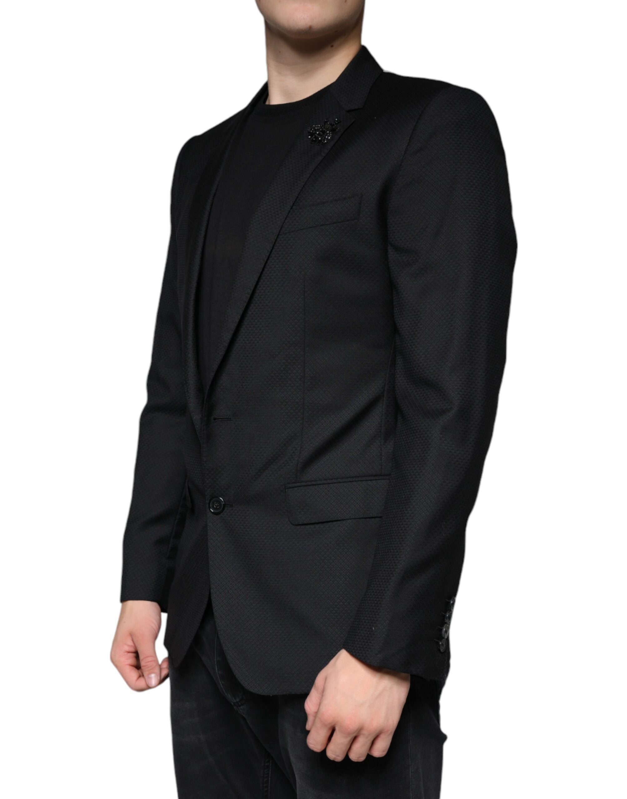 Experience the allure of the Dolce & Gabbana Black MARTINI Bee Blazer, a masterpiece of 100% virgin wool that epitomizes luxury and timeless elegance for the discerning individual.