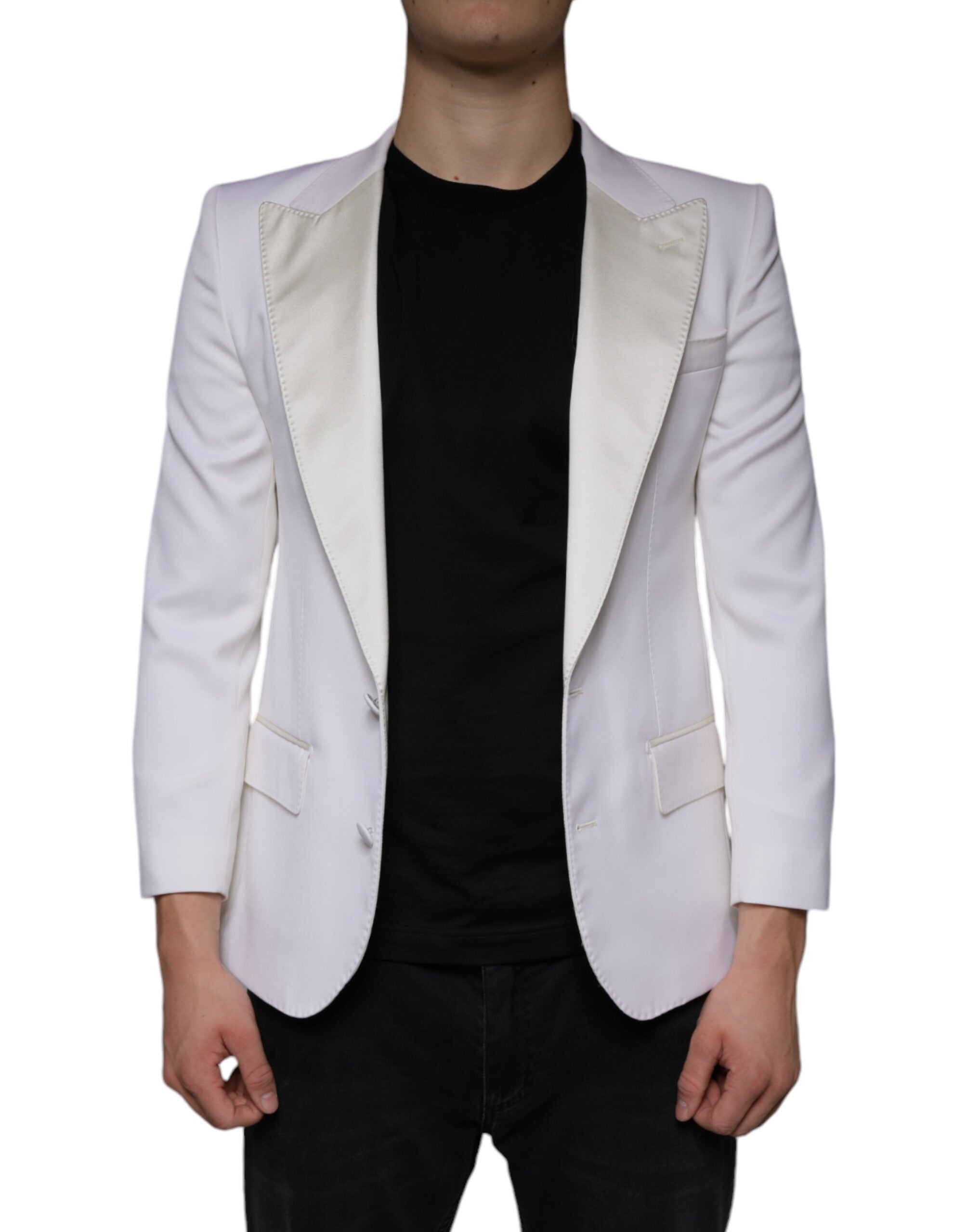 Elevate your wardrobe with the Dolce & Gabbana Off White Wool Single Breasted Dress Blazer, a masterpiece of exquisite craftsmanship, blending luxurious virgin wool and silk for timeless sophistication.