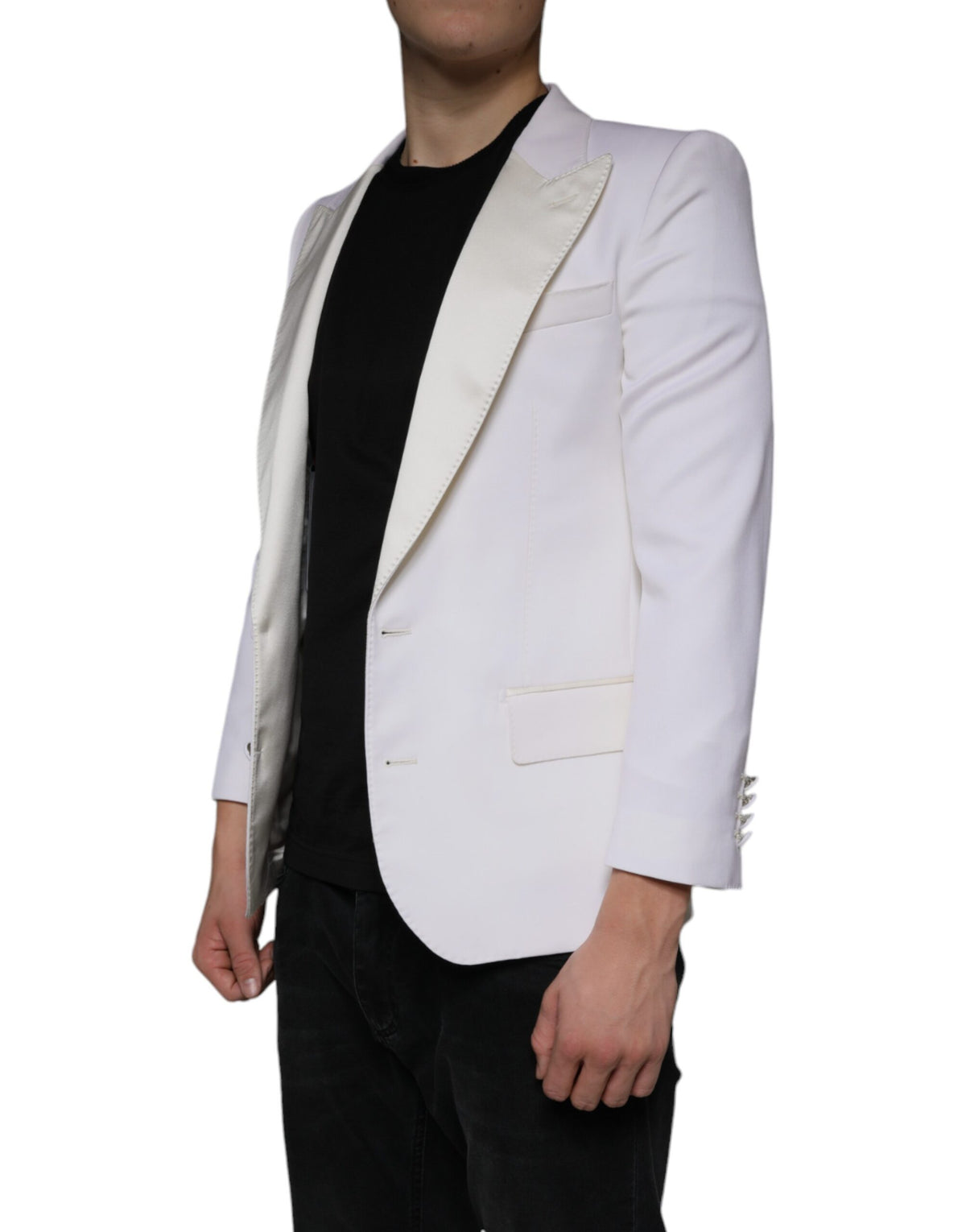 Elevate your wardrobe with the Dolce & Gabbana Off White Wool Single Breasted Dress Blazer, a masterpiece of Italian craftsmanship that embodies timeless elegance and sophistication.