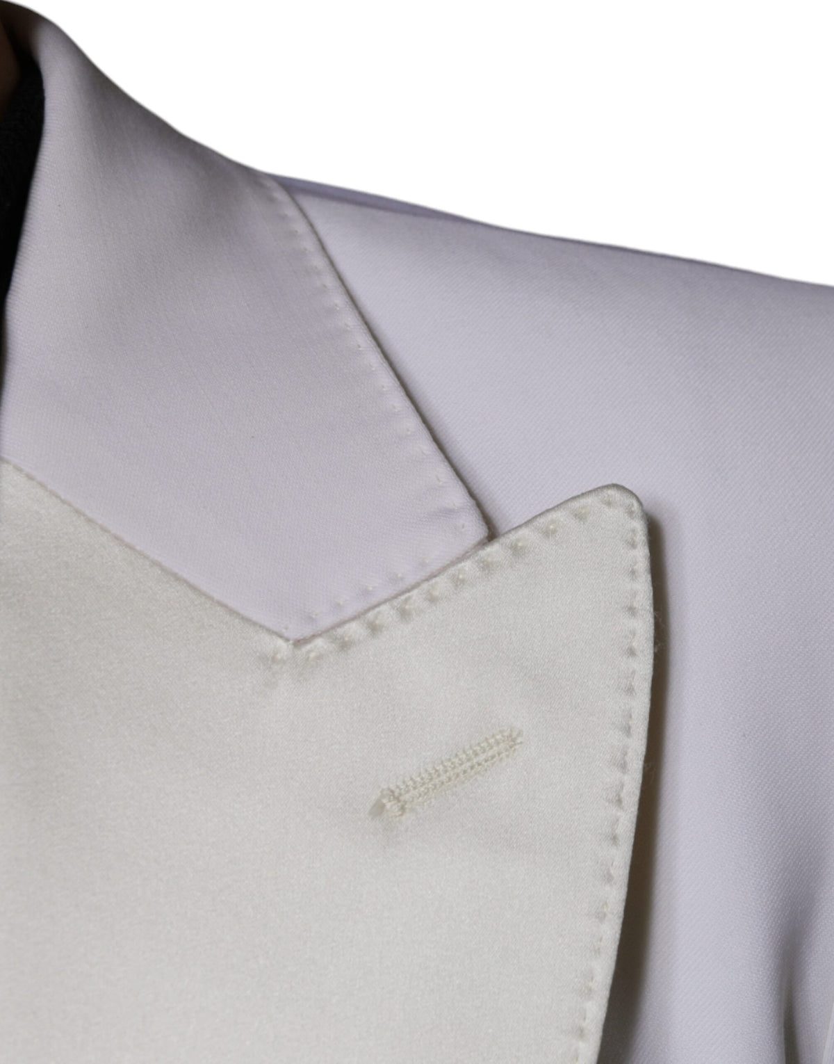 Elevate your wardrobe with the Dolce & Gabbana Off White Wool Single Breasted Dress Blazer, a masterpiece of Italian craftsmanship in luxurious virgin wool and silk.