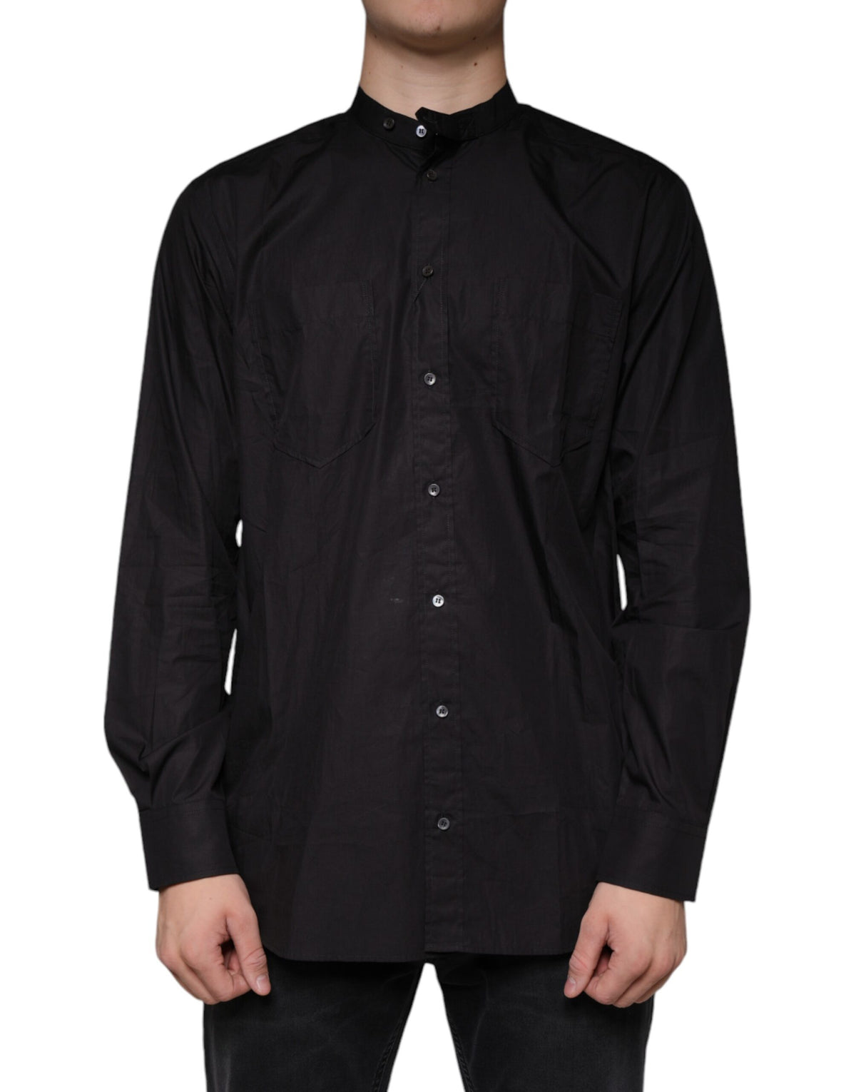 Discover the Dolce & Gabbana Black Cotton Button Down Shirt, a masterpiece of Italian craftsmanship that embodies timeless elegance and sophistication for the discerning individual.
