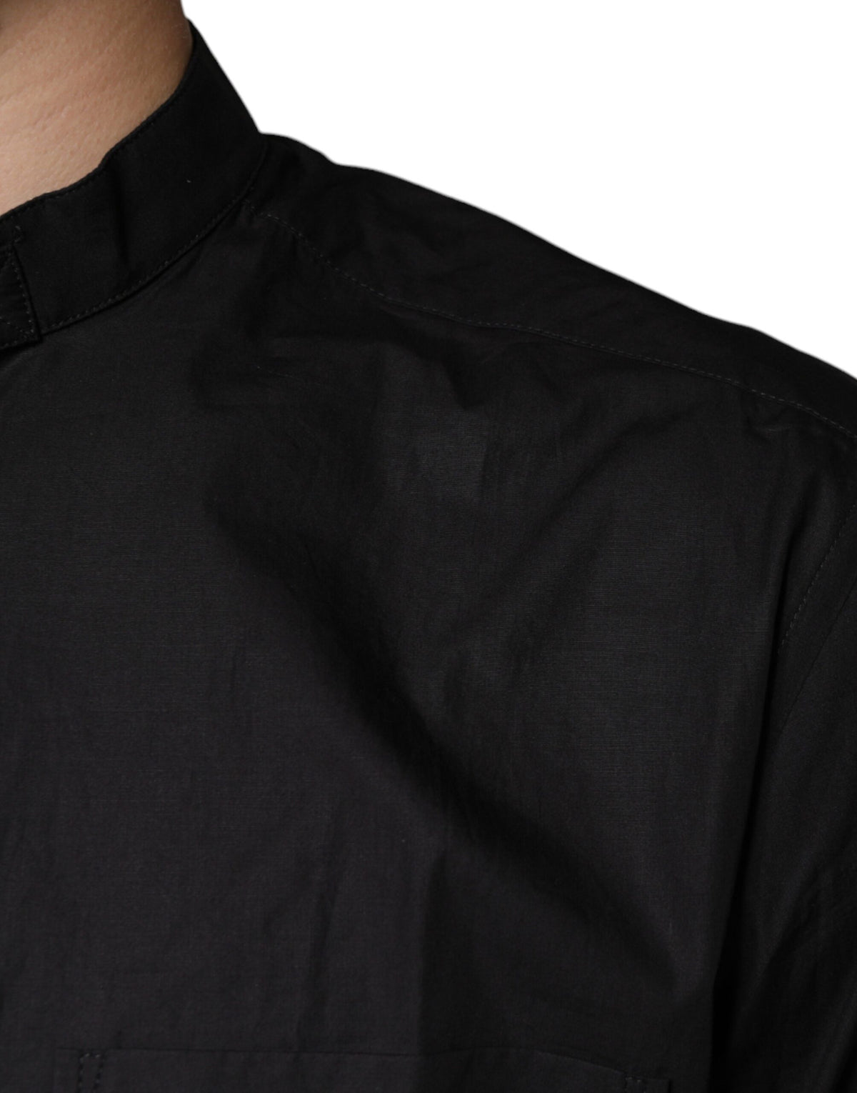 Indulge in the allure of the Dolce & Gabbana Black Cotton Button Down Shirt, a masterpiece of Italian craftsmanship that embodies sophistication and timeless elegance.
