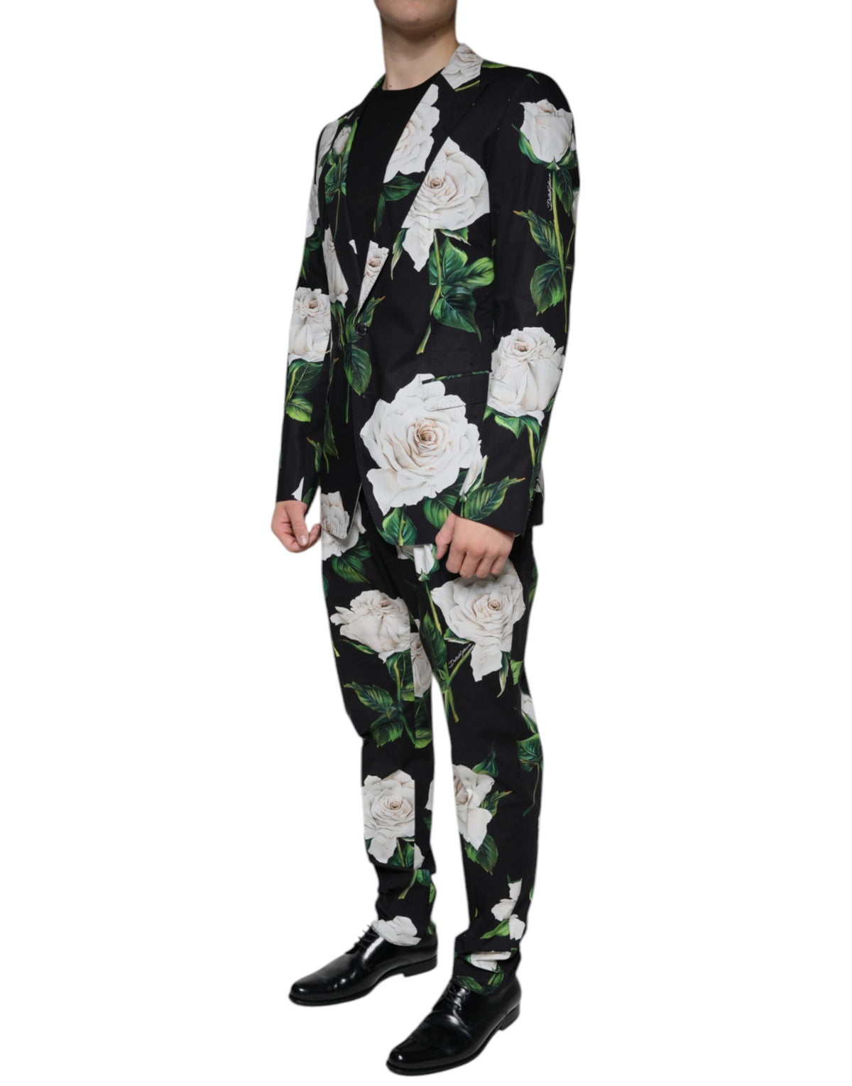 Indulge in the exquisite Dolce & Gabbana Black Rose Cotton Suit, where timeless elegance meets contemporary luxury, crafted for the discerning individual.