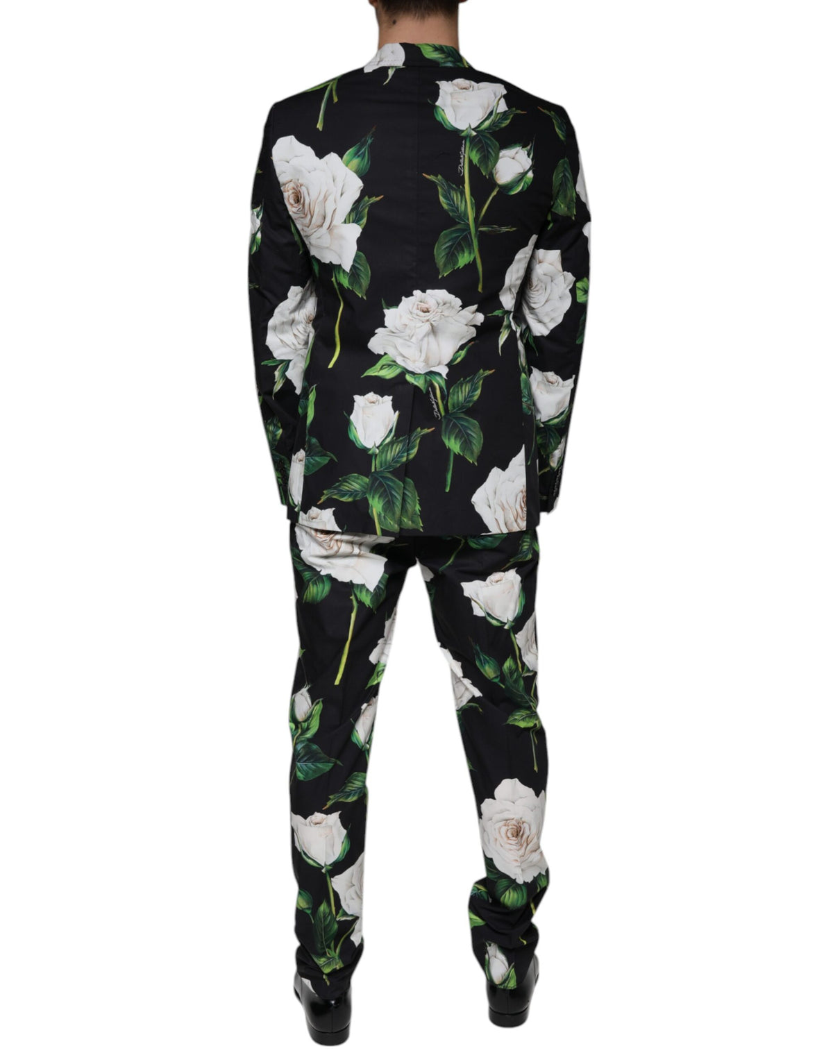 Elevate your wardrobe with the Dolce & Gabbana Black Rose Cotton Suit, a masterpiece of Italian craftsmanship, merging timeless elegance with contemporary allure.