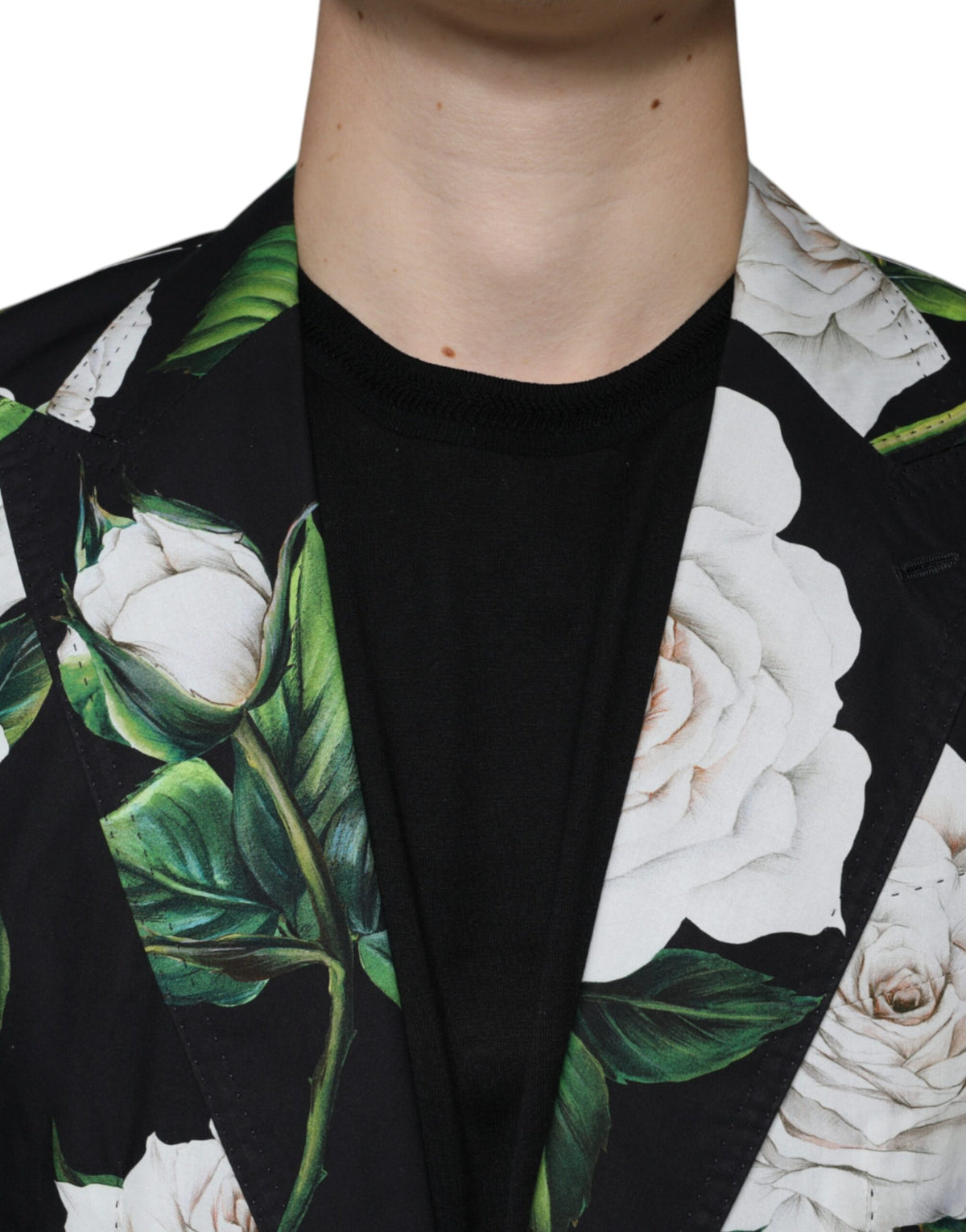 Indulge in the exquisite Dolce & Gabbana Black Rose Cotton Suit, a masterpiece of Italian craftsmanship that embodies timeless elegance and sophisticated allure.