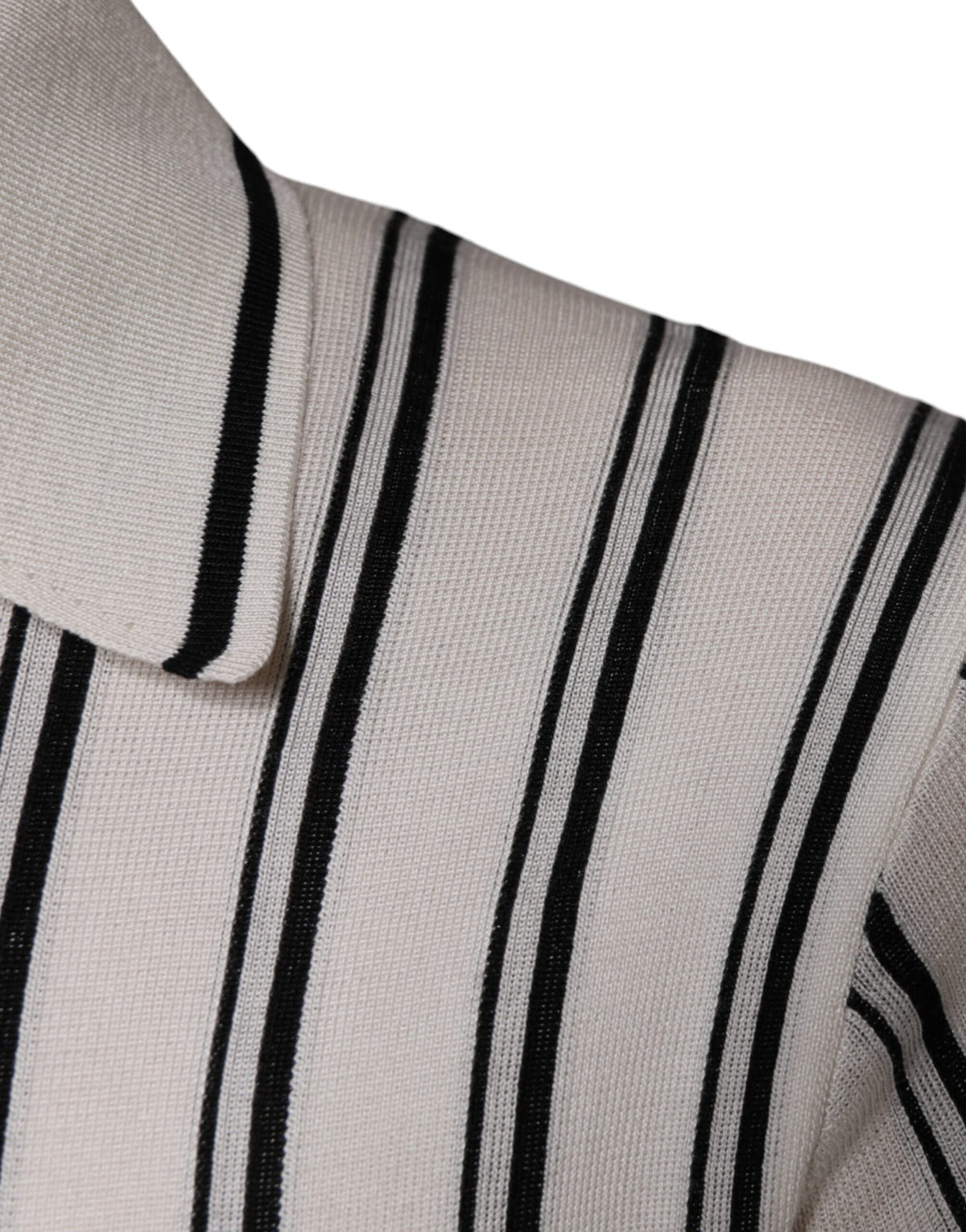 Elevate your wardrobe with the Dolce & Gabbana White Black Stripe Polo Short Sleeve T-shirt, a luxurious silk piece that embodies sophistication and timeless elegance.