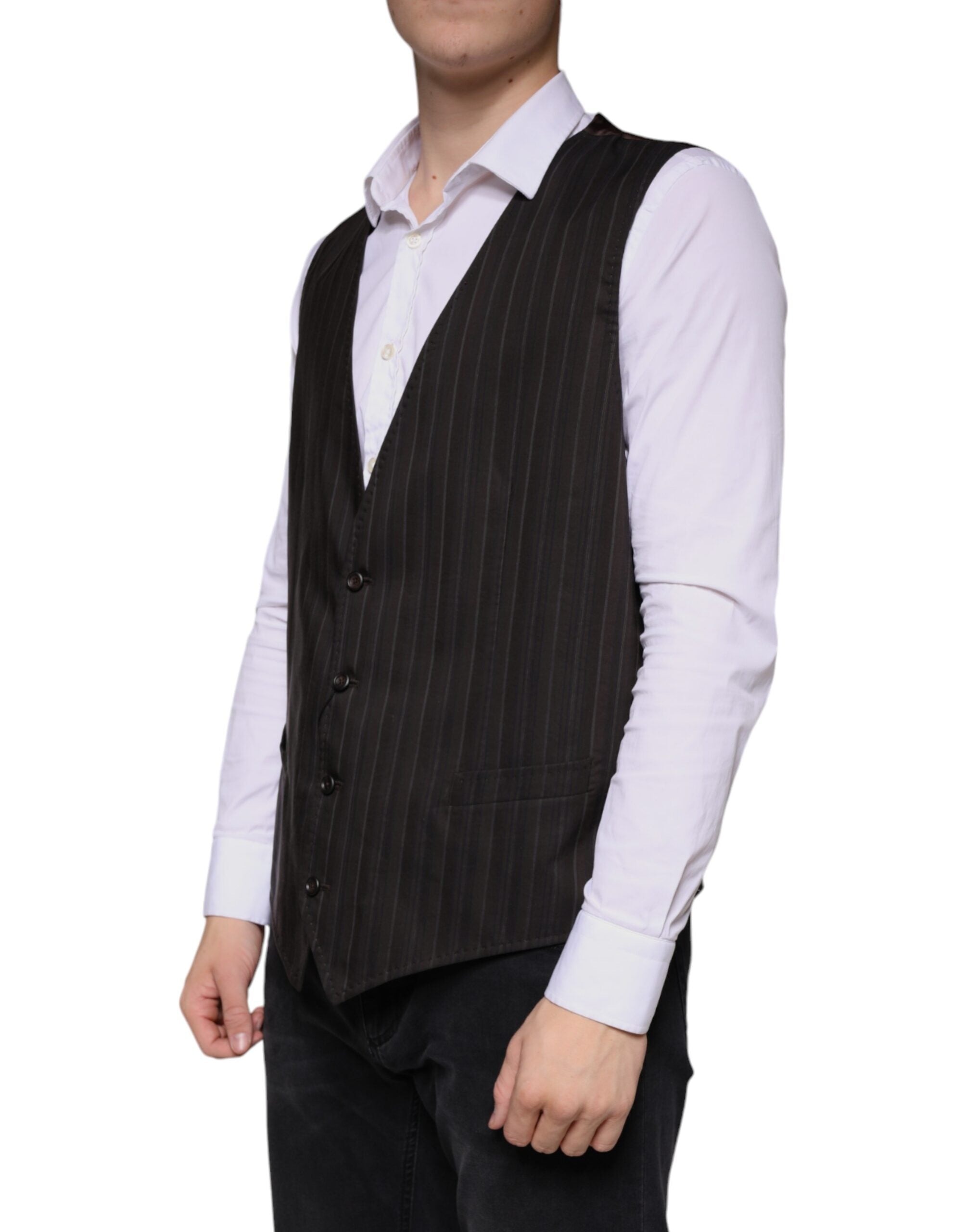 Elevate your wardrobe with the Dolce & Gabbana Black Cotton Waistcoat Dress, a masterpiece of Italian craftsmanship, blending luxurious materials for timeless sophistication.