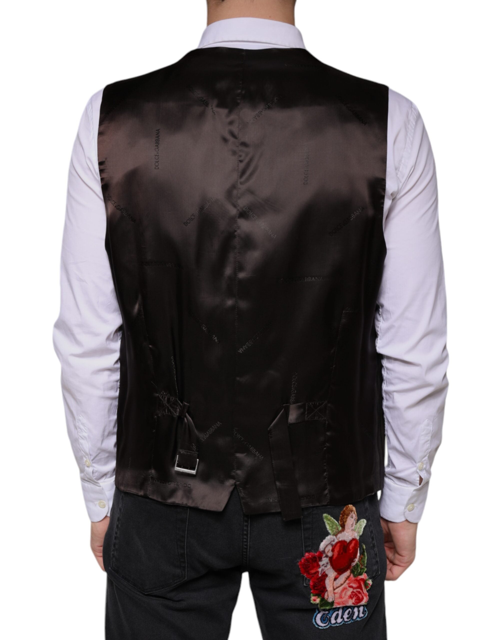Elevate your wardrobe with the Dolce & Gabbana Black Cotton Waistcoat Dress, a masterpiece of Italian craftsmanship, blending luxe materials for timeless sophistication.
