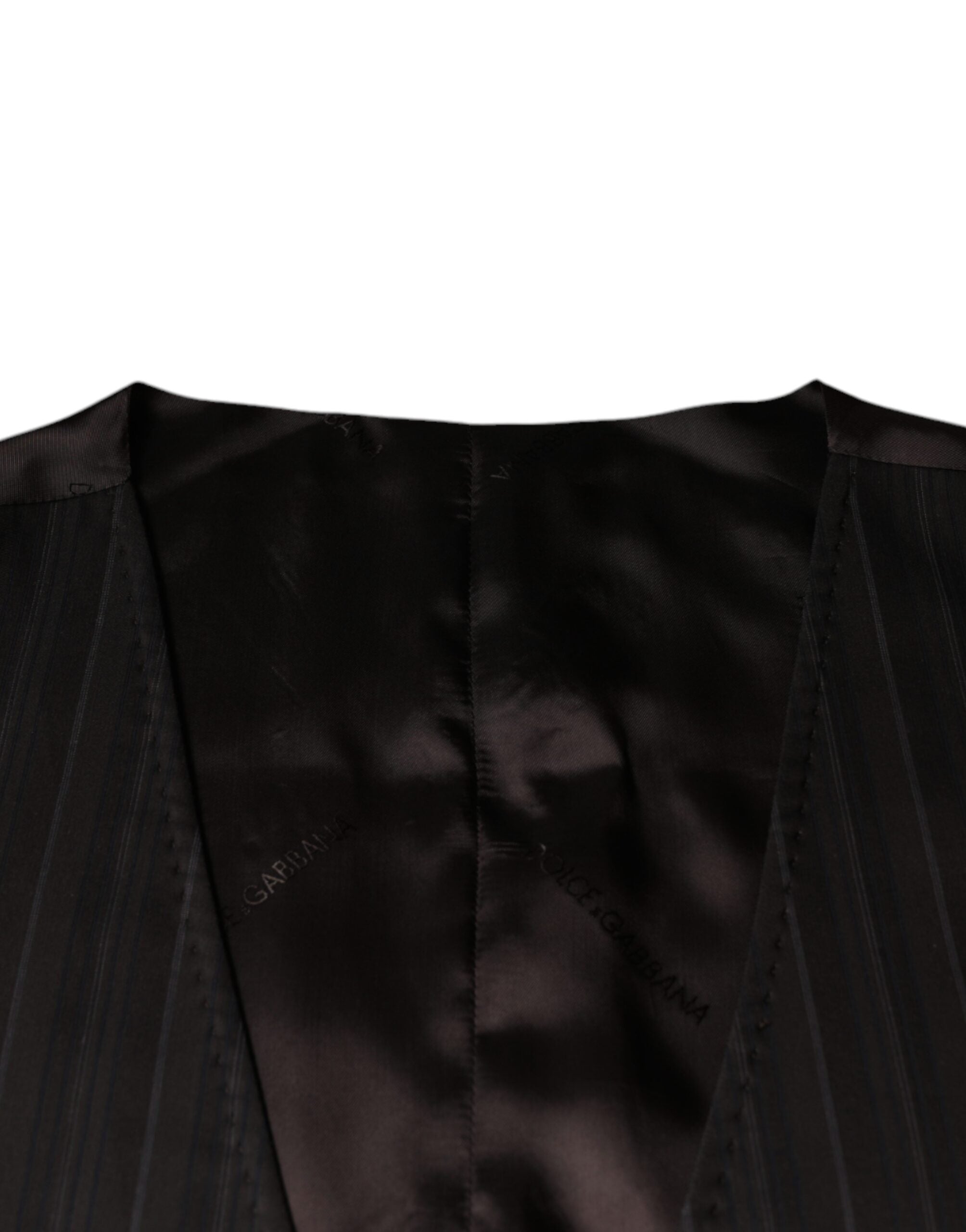 Elevate your wardrobe with the Dolce & Gabbana Black Cotton Waistcoat Dress, a timeless piece of Italian craftsmanship that embodies refined elegance and sophisticated allure.