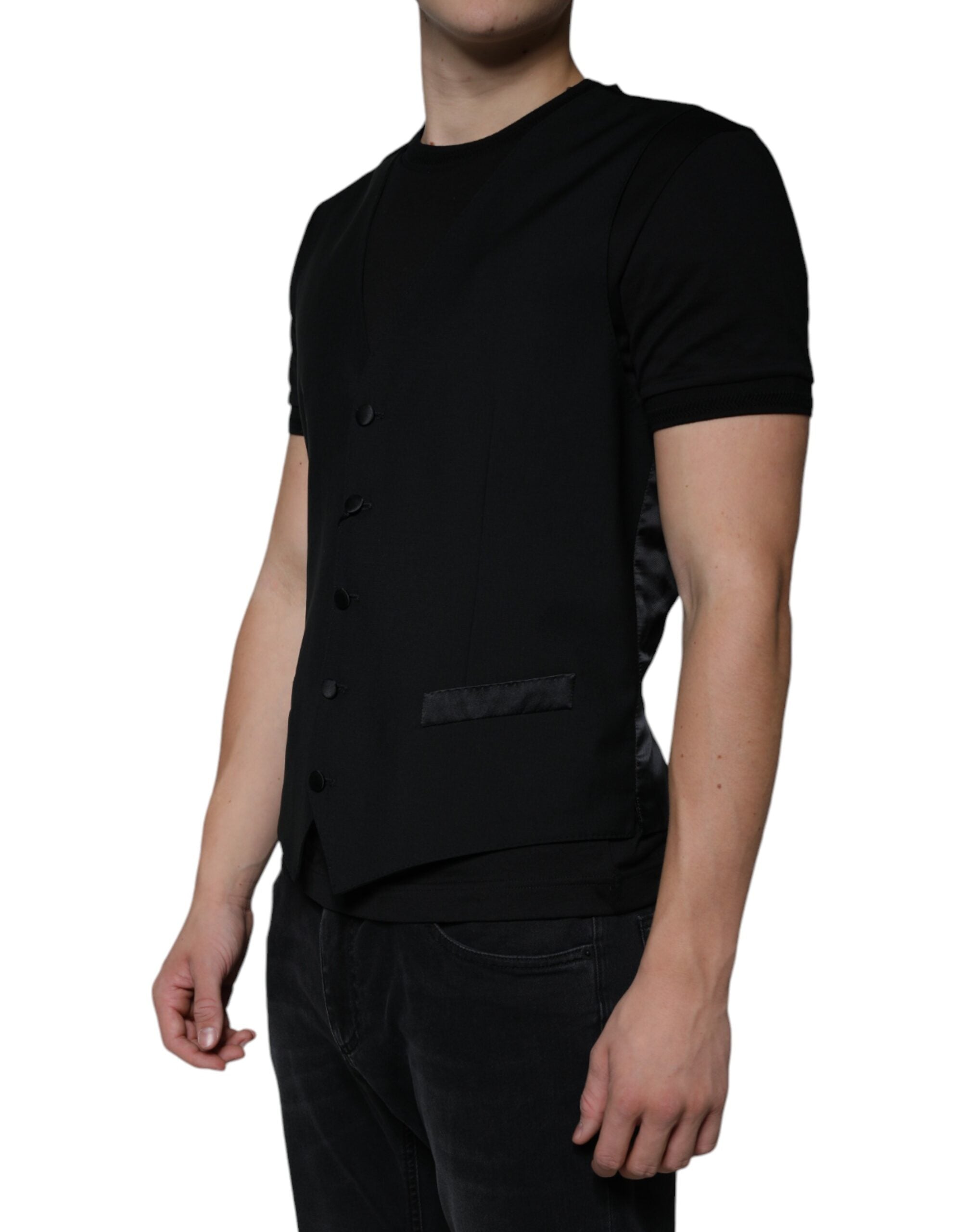 Discover the Dolce & Gabbana Black Wool Formal Dress Waistcoat Vest, an exquisite blend of luxurious materials and exceptional craftsmanship, perfect for elevating any sophisticated ensemble.