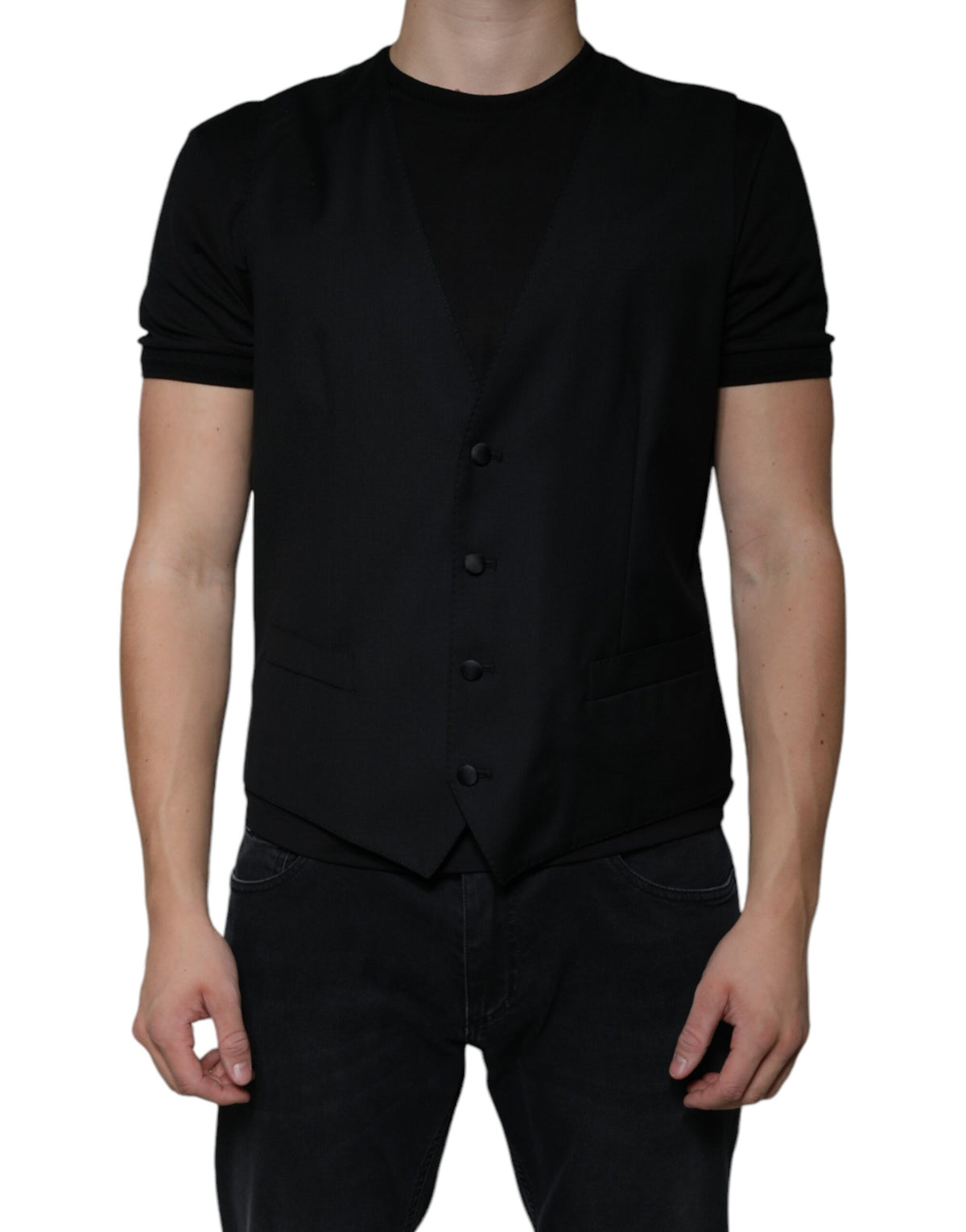 Elevate your wardrobe with the Dolce & Gabbana Black Wool Waistcoat Dress, a masterpiece of luxurious virgin wool, designed for the confident individual who embodies timeless elegance.