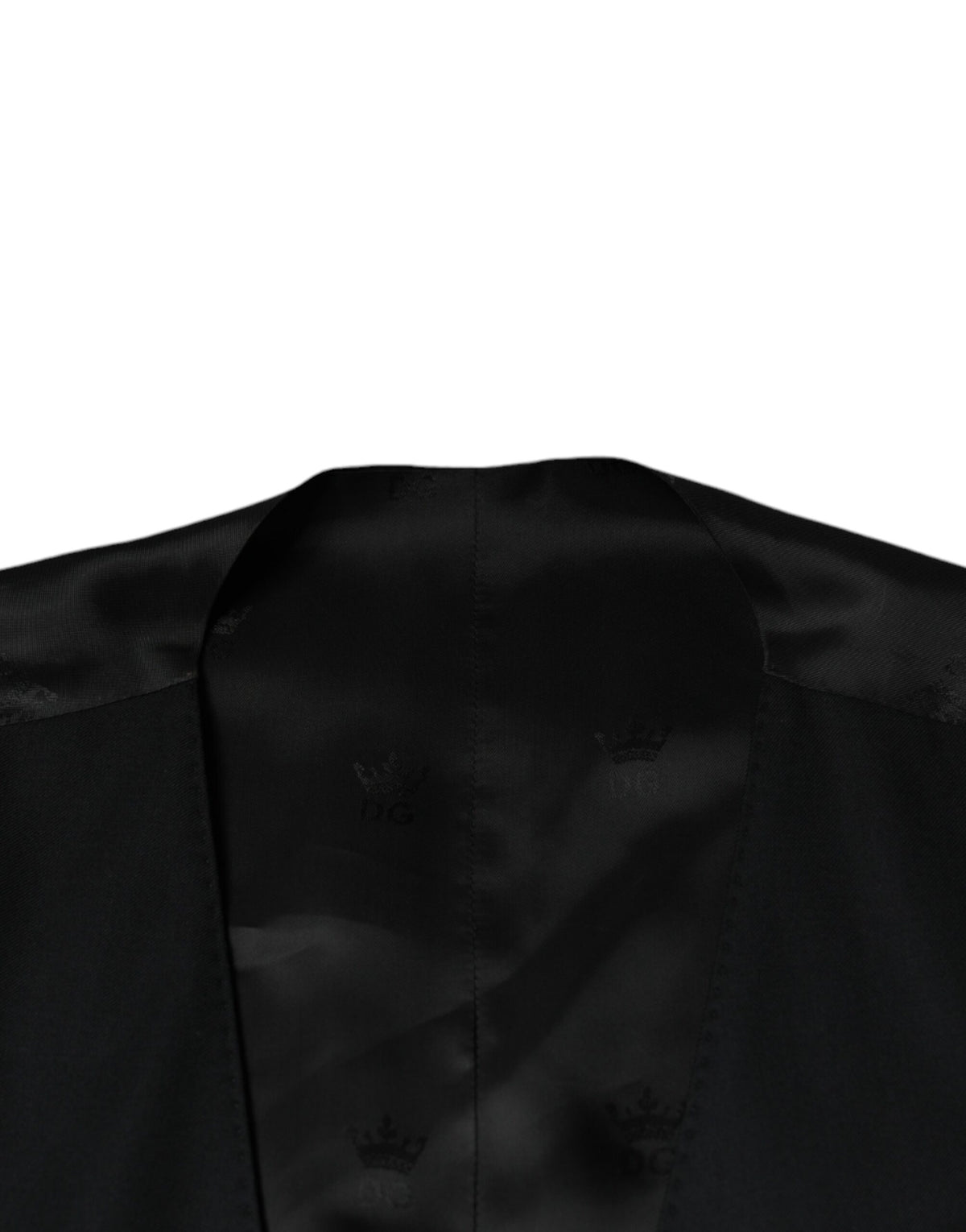 Elevate your wardrobe with the Dolce & Gabbana Black Wool Waistcoat Dress, a masterpiece of virgin wool craftsmanship that embodies timeless elegance and sophisticated allure.