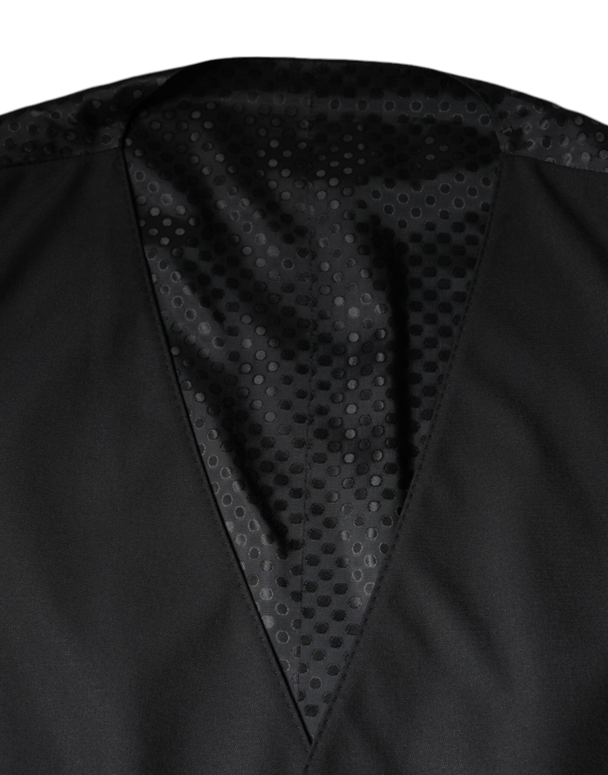 Elevate your wardrobe with the Dolce & Gabbana Black Wool Waistcoat Dress Formal Vest, a masterpiece of virgin wool and silk, embodying timeless elegance and Italian craftsmanship.