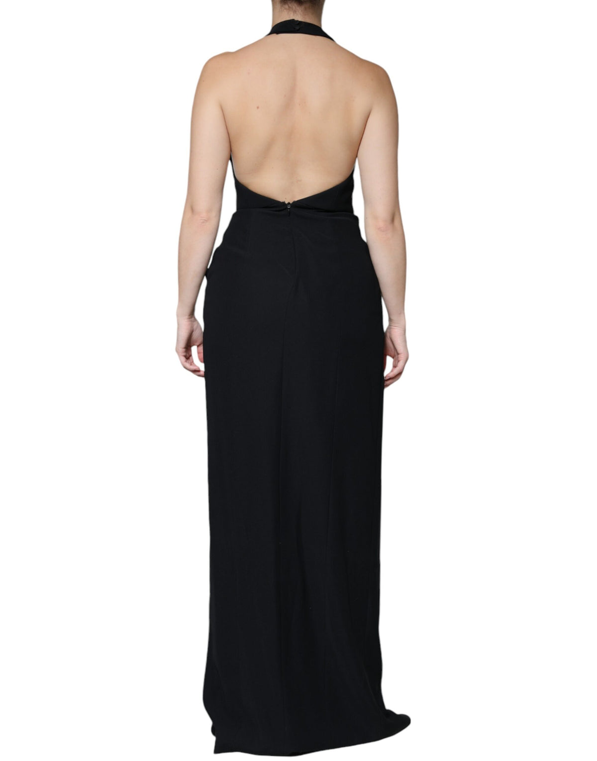 Indulge in the allure of the Emporio Armani Black Sleeveless Halter Sheath Long Gown, a timeless masterpiece crafted in Italy from luxurious polyester, embodying sophistication and elegance for every grand occasion.