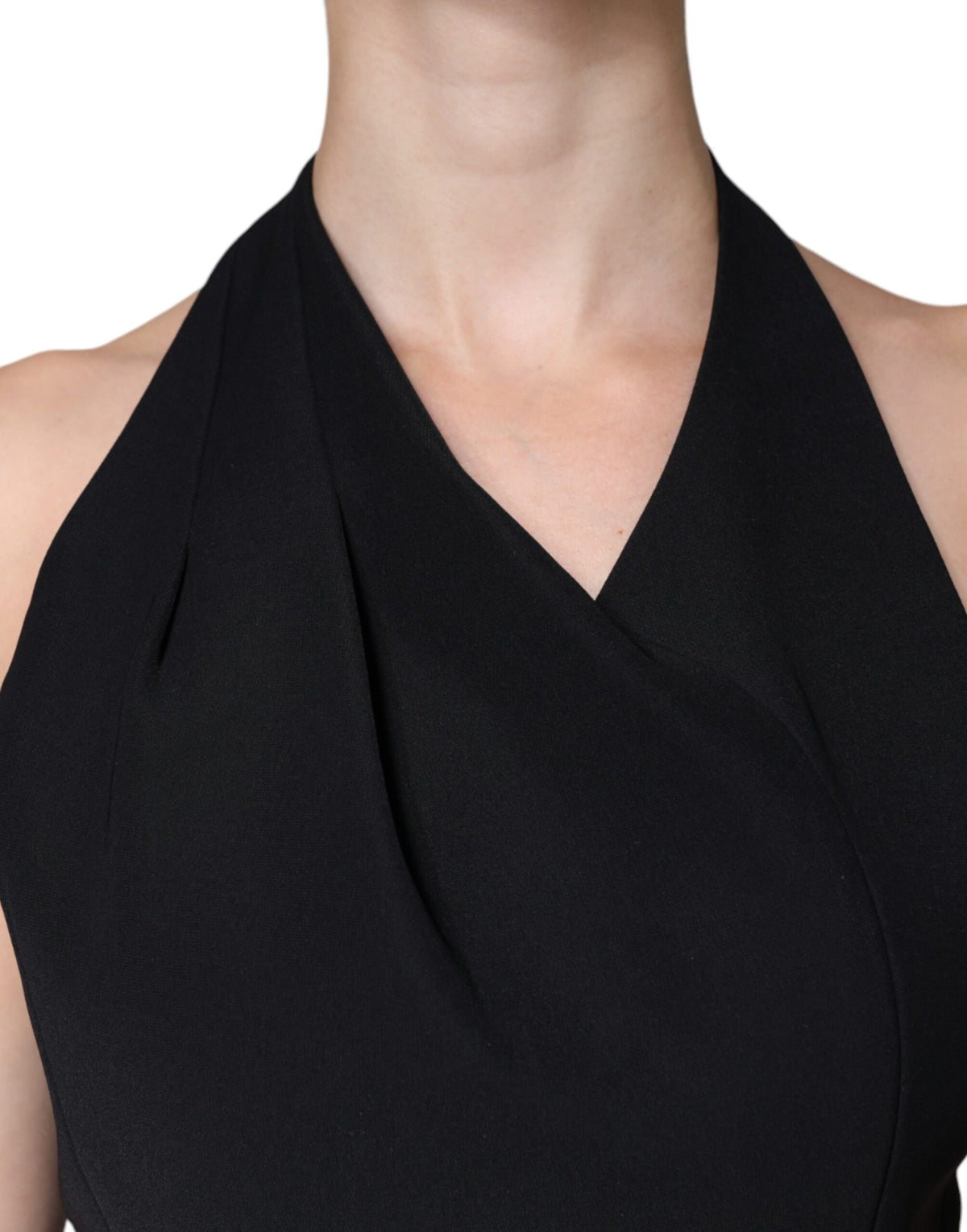 Discover the Emporio Armani Black Sleeveless Halter Sheath Long Gown, a luxurious blend of Italian craftsmanship and timeless elegance, perfect for unforgettable evenings.