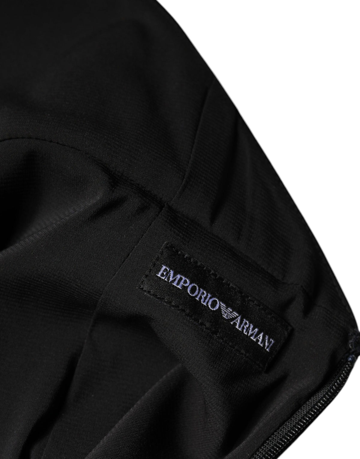 Experience the allure of the Emporio Armani Black Sleeveless Halter Sheath Long Gown, crafted in Italy from luxurious polyester, embodying timeless elegance and sophistication.