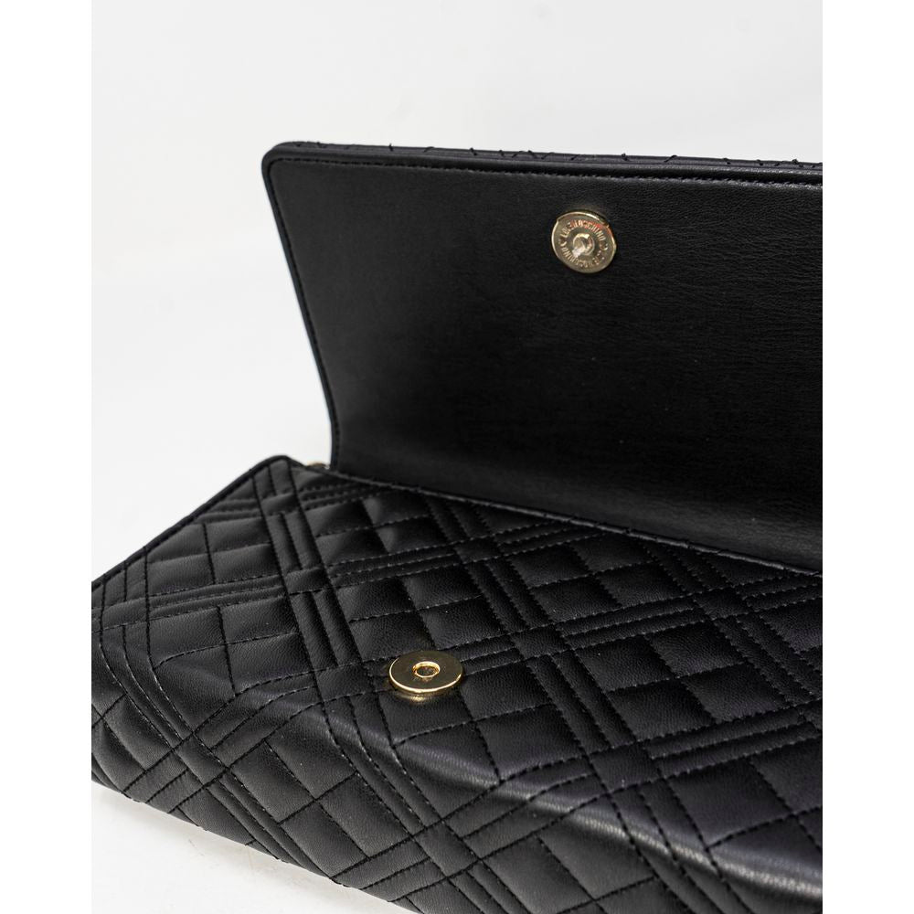 Discover the Love Moschino Black Polyethylene Handbag, a masterpiece of chic quilted design and luxurious polyurethane, perfect for elevating your style with timeless elegance.