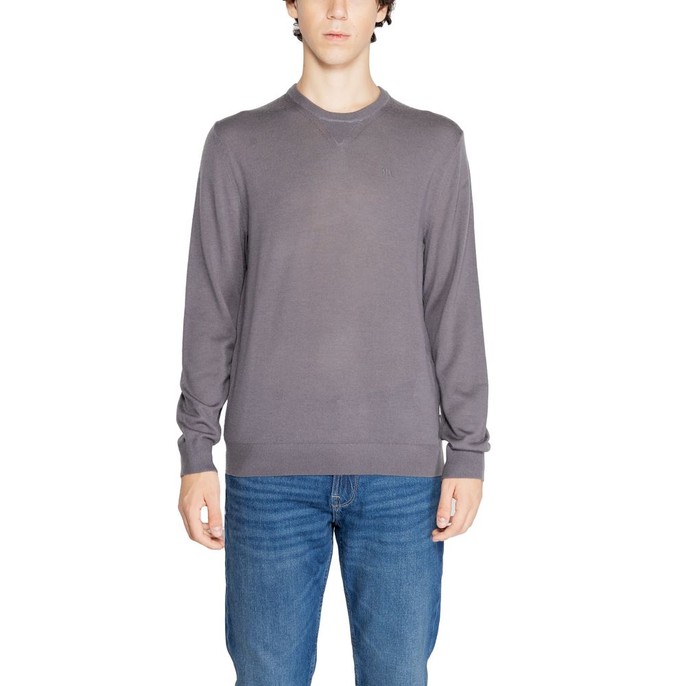 Elevate your wardrobe with the Armani Exchange Gray Wool Sweatshirt, a luxurious blend of wool and elegance, perfect for those who embody sophistication and style.