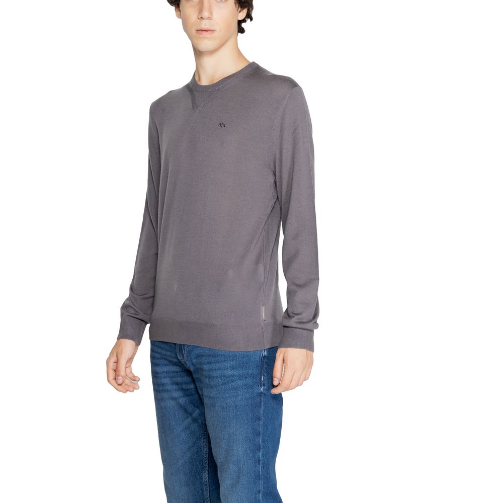 Experience the exquisite Armani Exchange Gray Wool Sweatshirt, a blend of luxury and modern elegance, crafted for those who embody sophistication and style.