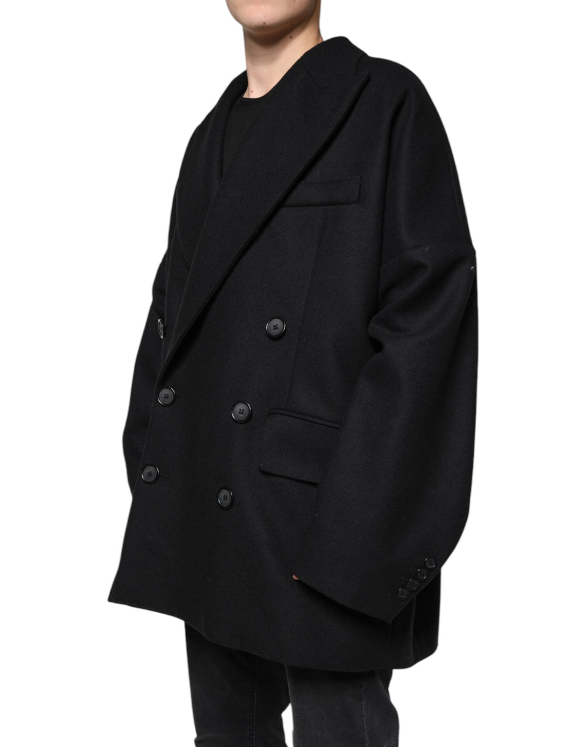 Discover the Dolce & Gabbana Black Wool Double Breasted Men Coat Jacket, a masterpiece of Italian craftsmanship blending luxurious virgin wool and nylon for timeless elegance.