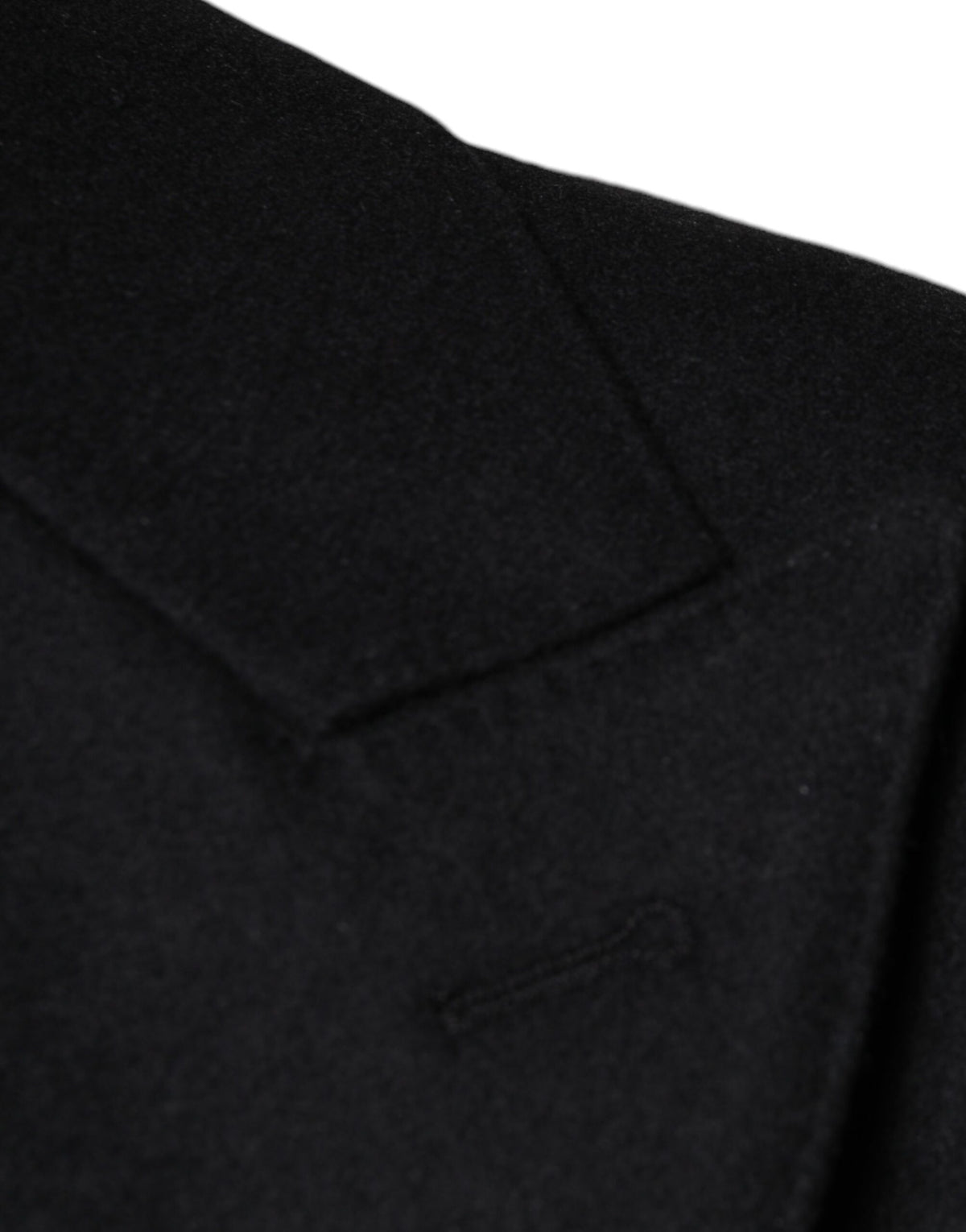 Discover the Dolce & Gabbana Black Wool Double Breasted Men Coat Jacket, a masterful blend of luxury and sophistication, crafted in Italy for the discerning individual.