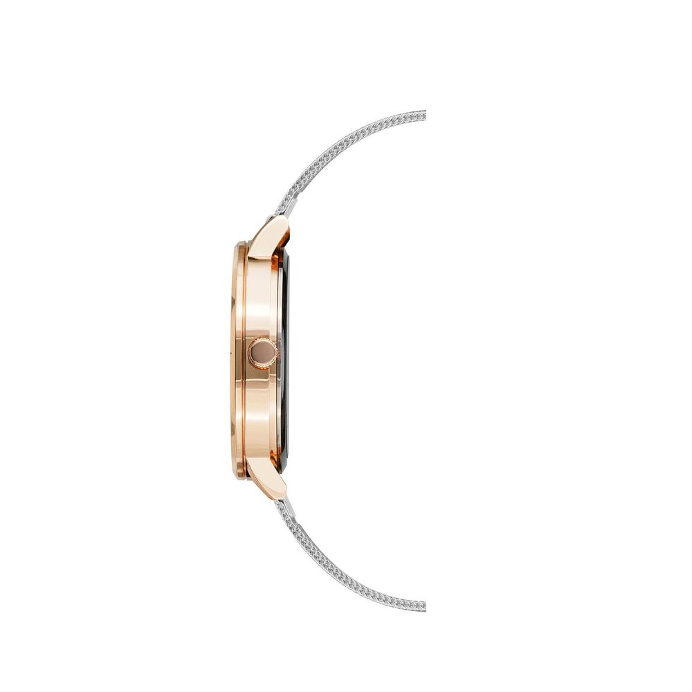Indulge in the exquisite Juicy Couture Silver Stainless Steel Dress Watch, a timeless masterpiece of quartz craftsmanship that elevates your elegance and sophistication.