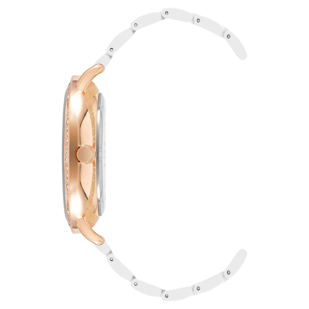 Discover the Juicy Couture White Metal Dress Watch, a timeless blend of elegance and precision, perfect for those who embody sophistication and allure.