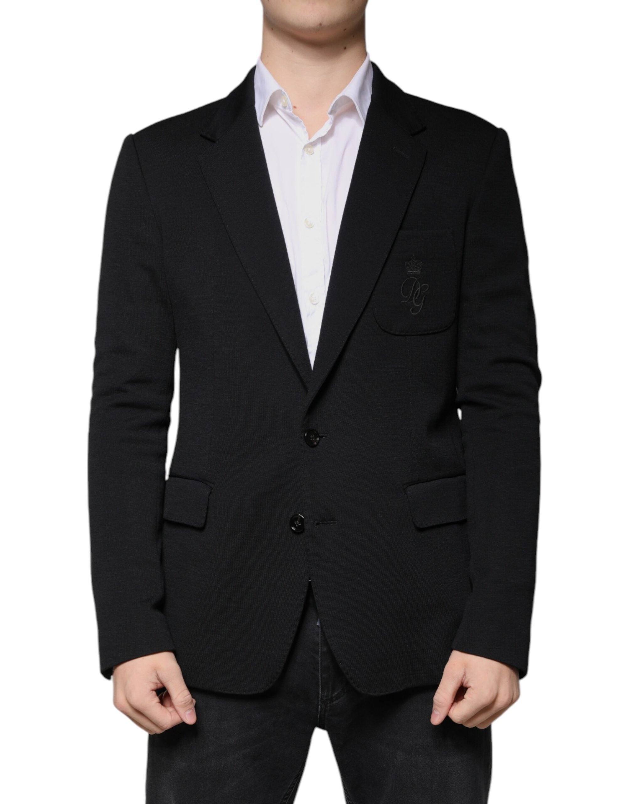 Experience the exquisite craftsmanship of the Dolce & Gabbana Black Wool Single Breasted Formal Blazer, a timeless piece that embodies luxury and sophistication.