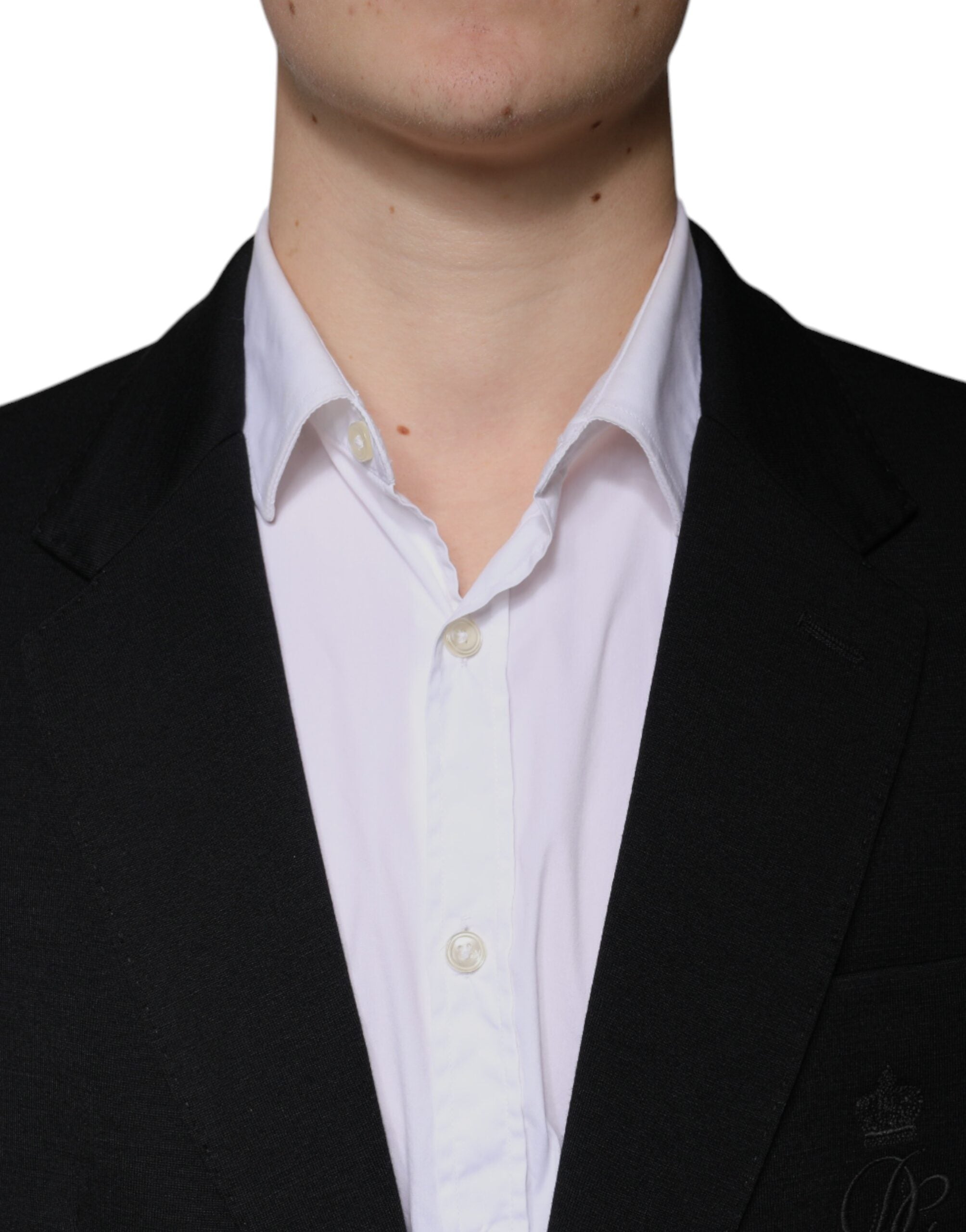 Experience the exquisite craftsmanship of the Dolce & Gabbana Black Wool Single Breasted Formal Blazer, a timeless piece that embodies luxury and sophistication for the discerning individual.