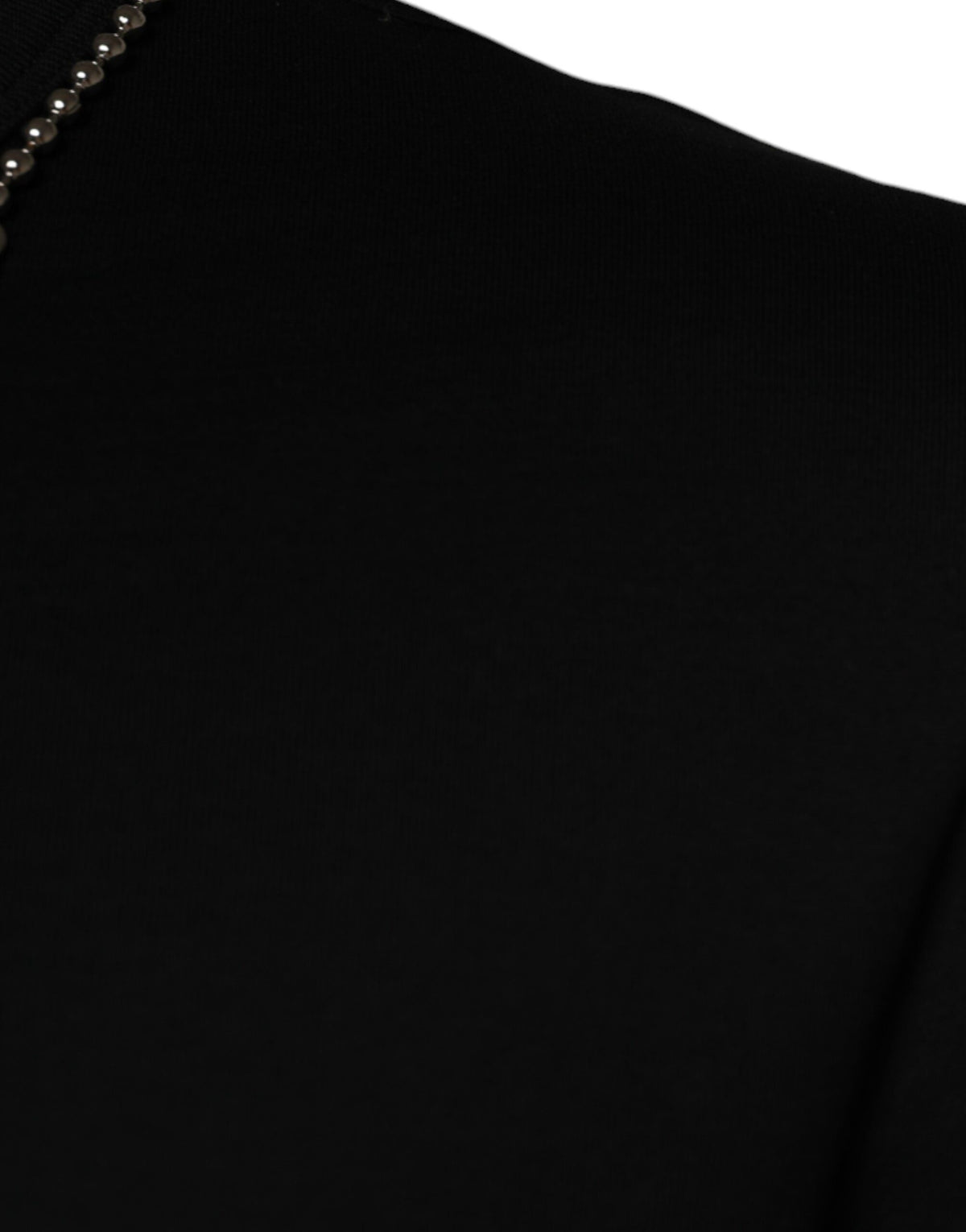Elevate your wardrobe with the Dolce & Gabbana Black Cotton Necklace Embellished T-shirt, a masterpiece of Italian craftsmanship that seamlessly blends luxury and comfort.