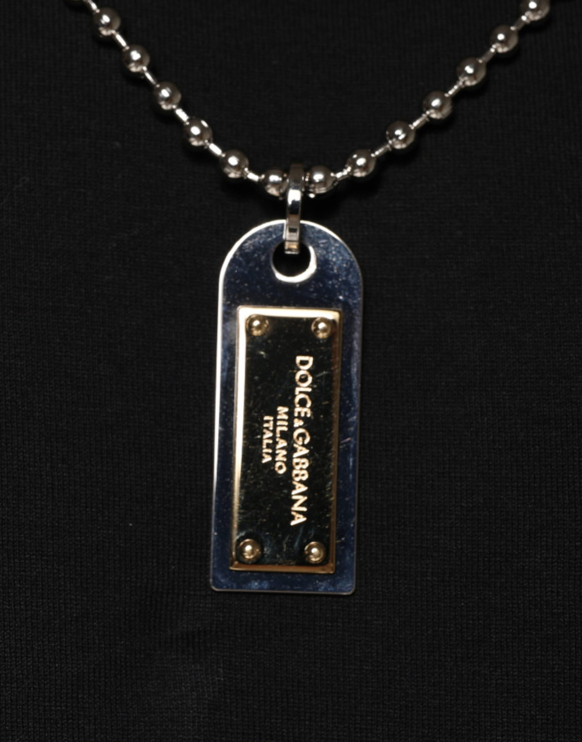 Elevate your wardrobe with the Dolce & Gabbana Black Cotton Necklace Embellished T-shirt, a luxurious blend of exquisite craftsmanship and timeless style, made in Italy.