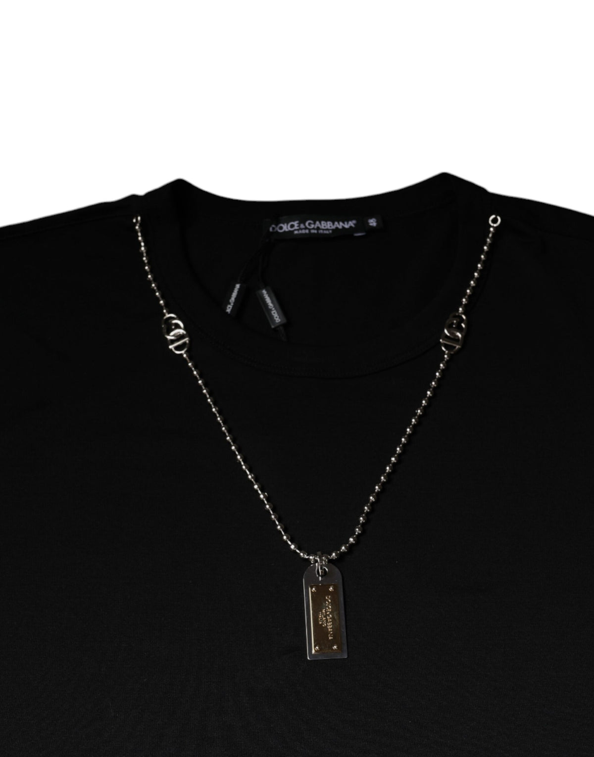 Elevate your wardrobe with the Dolce & Gabbana Black Cotton Necklace Embellished T-shirt, a masterpiece of Italian craftsmanship that seamlessly blends luxury and comfort for the discerning individual.
