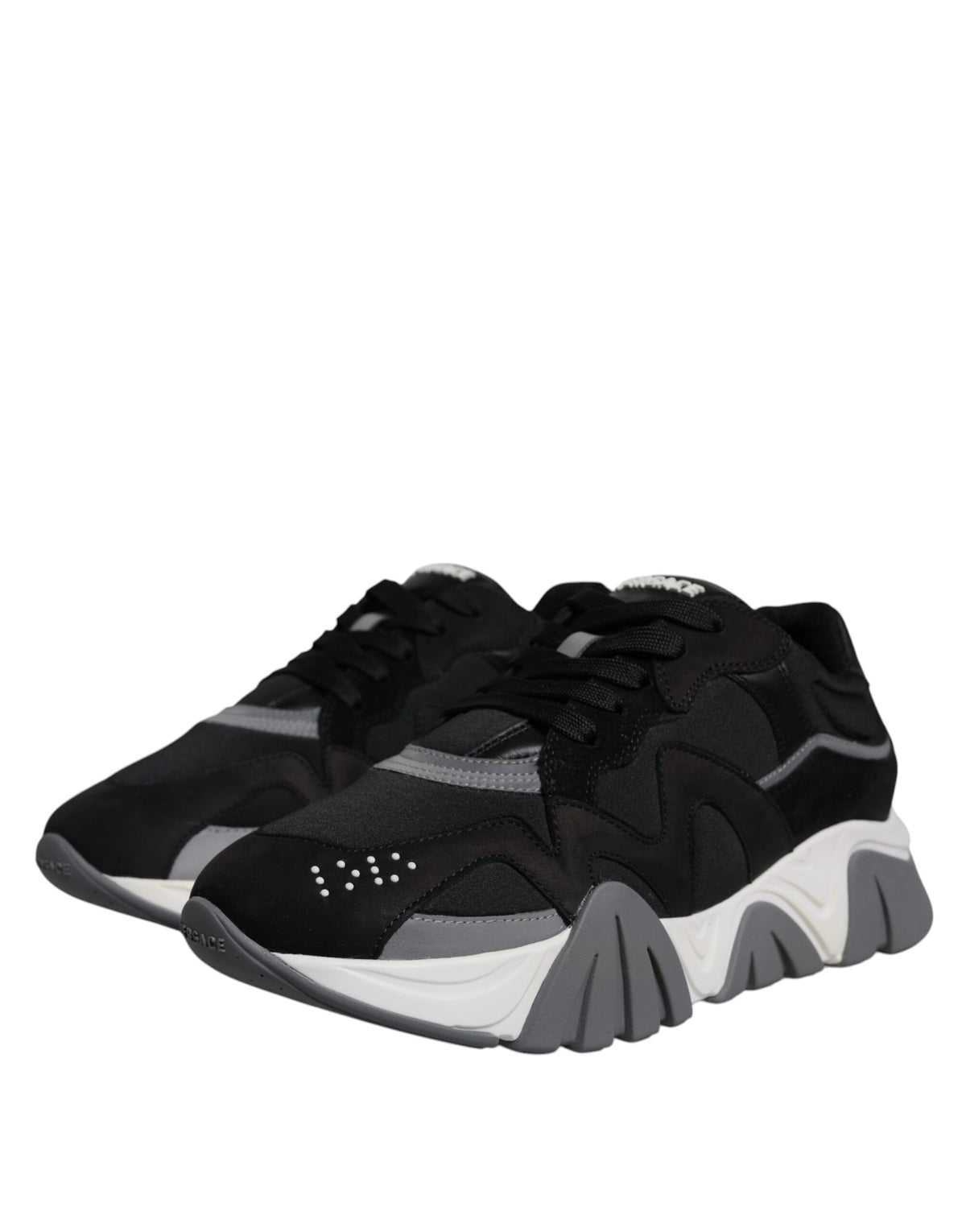 Elevate your style with Versace's Black Leather Neoprene Chunky Low Top Sneakers, a luxurious blend of Italian craftsmanship and bold design, perfect for any occasion.