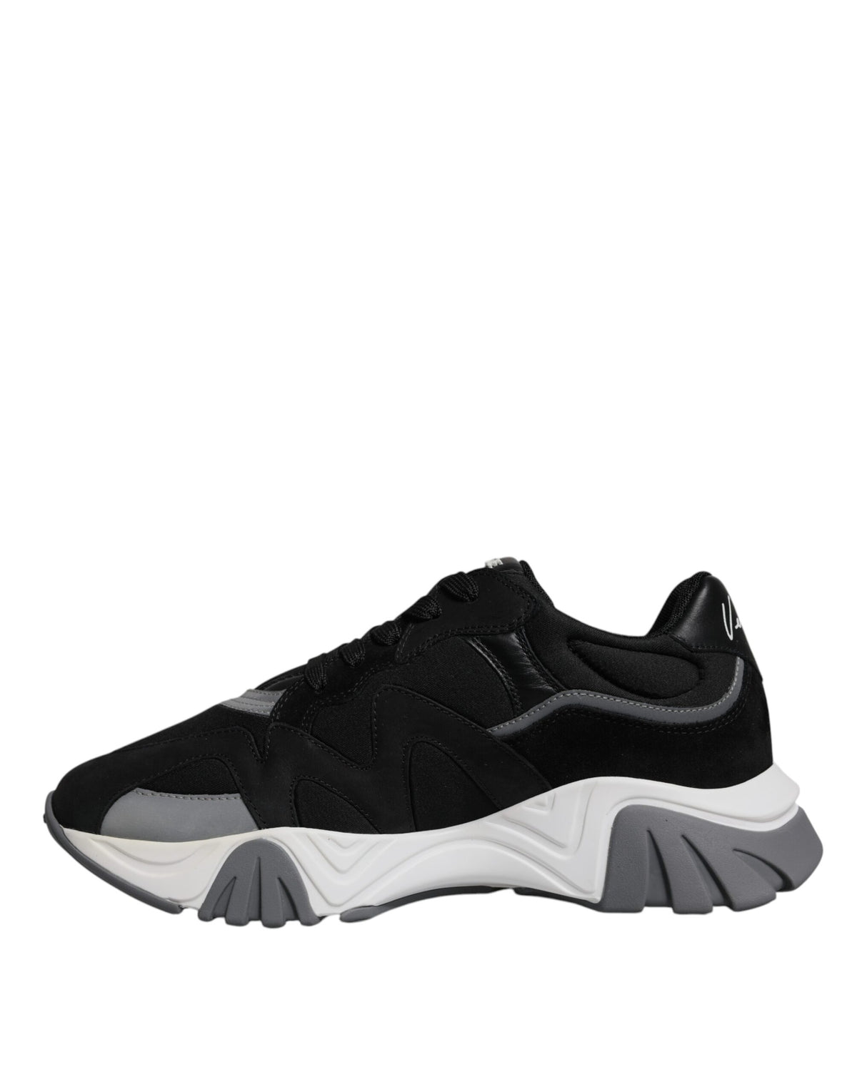 Elevate your style with Versace's Black Leather Neoprene Chunky Low Top Sneakers, a luxurious blend of Italian craftsmanship and bold design, perfect for any sophisticated occasion.