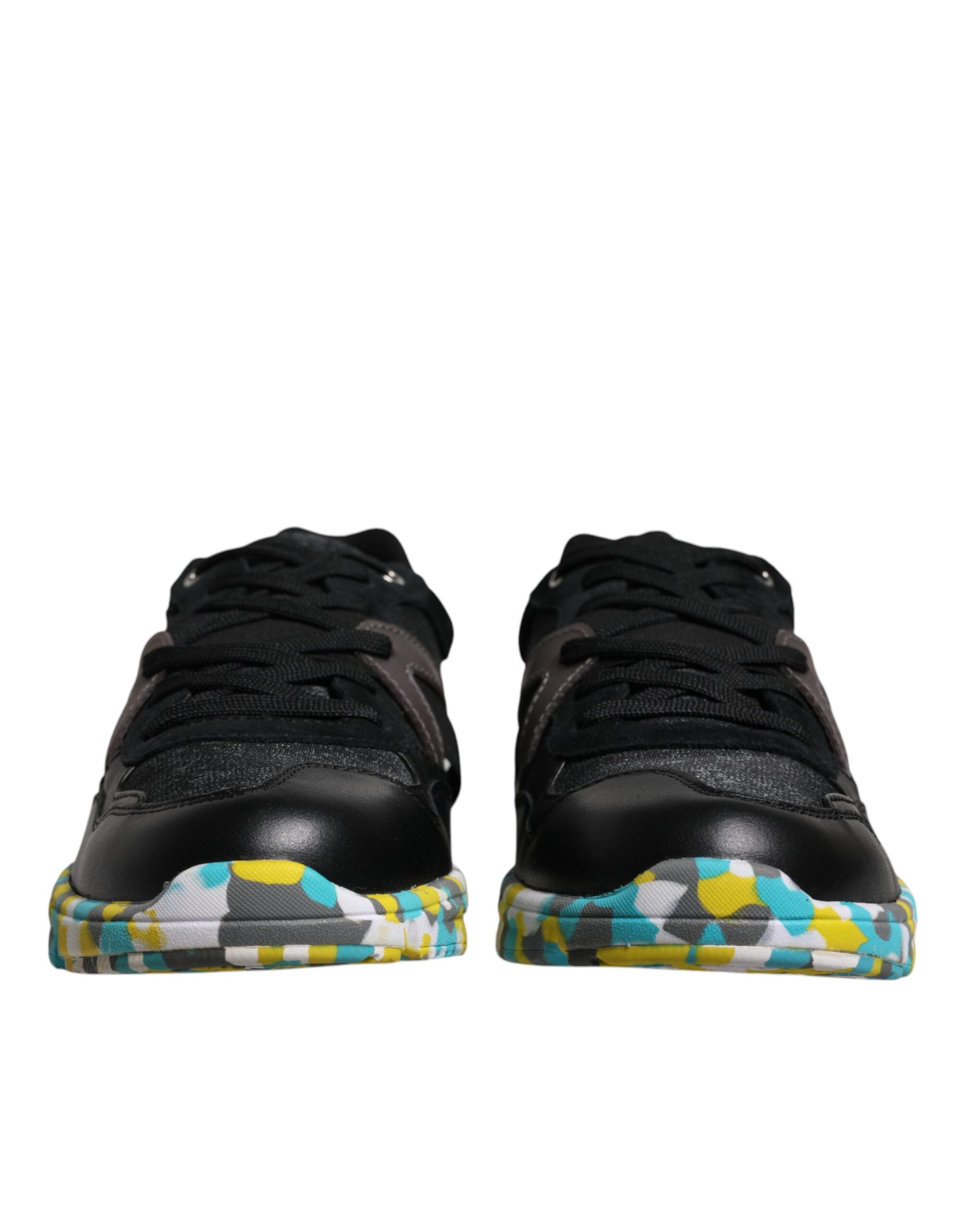 Elevate your style with Dolce & Gabbana's Black Polyester Low Top Sneakers, where exquisite craftsmanship meets luxurious materials for the discerning individual.